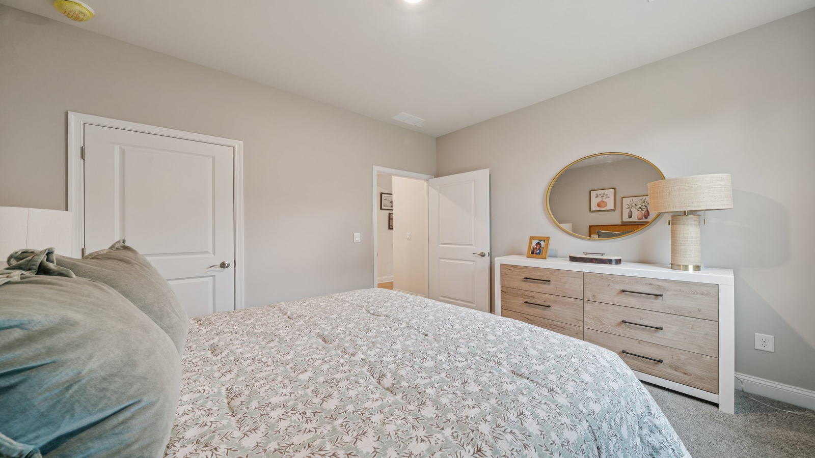 Secondary Bedroom in this New Home includes stellar carpet, bright window light, closet, ideal for guest or child use