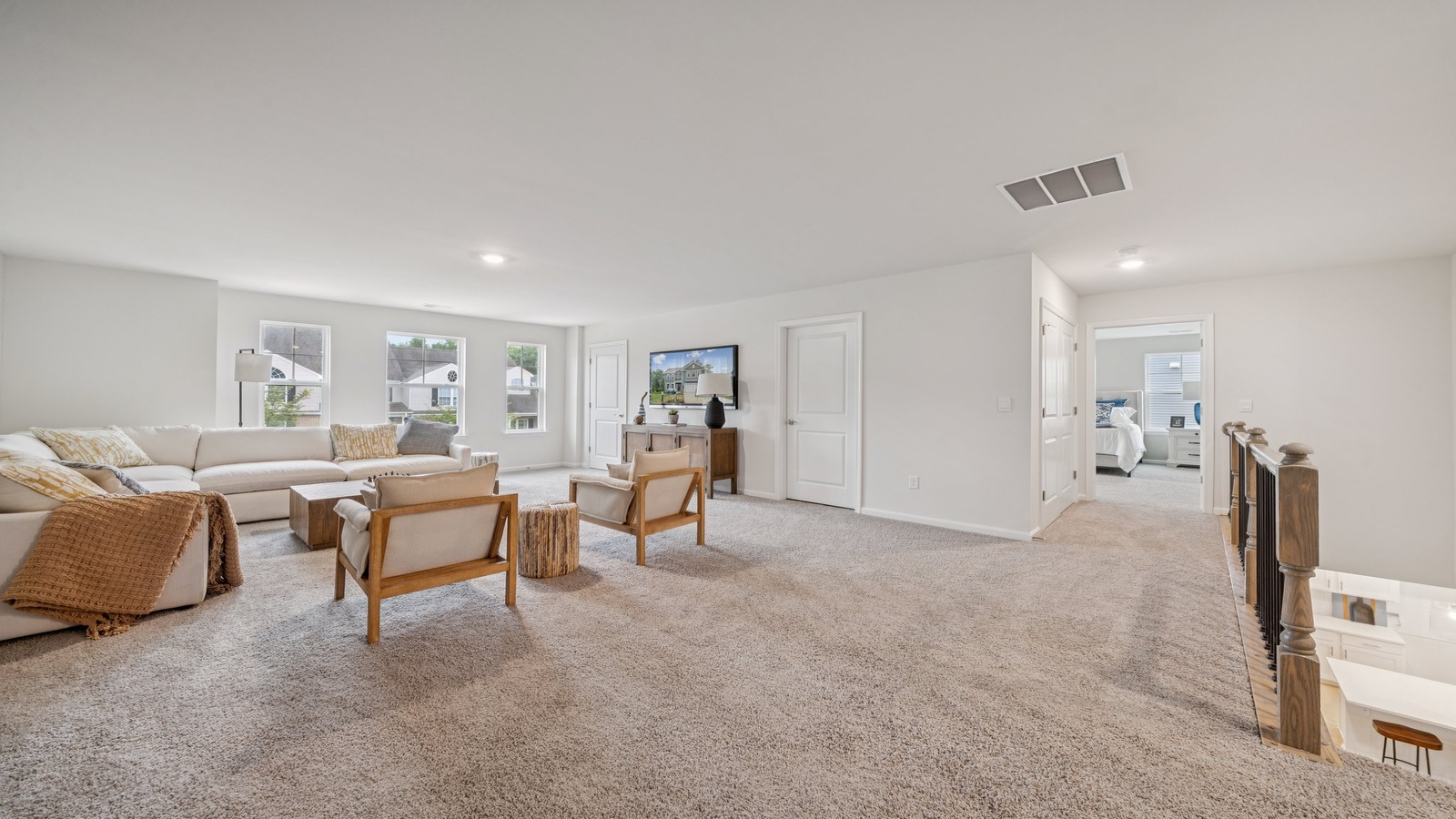 Loft + Secondary Bedroom features versatile loft space outside two secondary bedrooms, maximizing usability and privacy