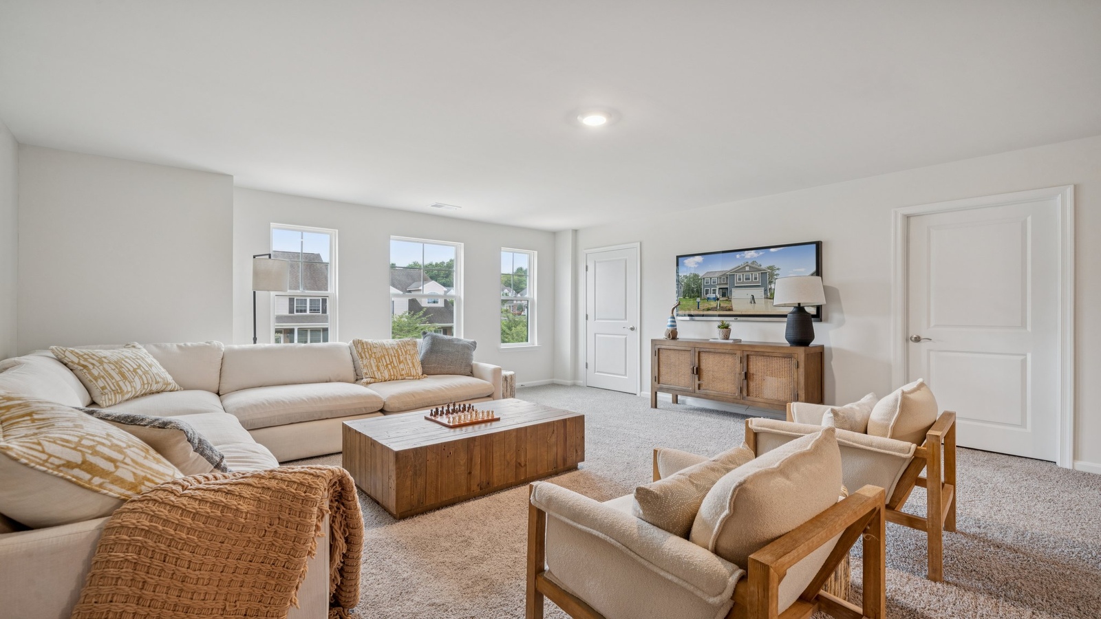 Loft + Secondary Bedroom features versatile loft space outside two secondary bedrooms, maximizing usability and privacy