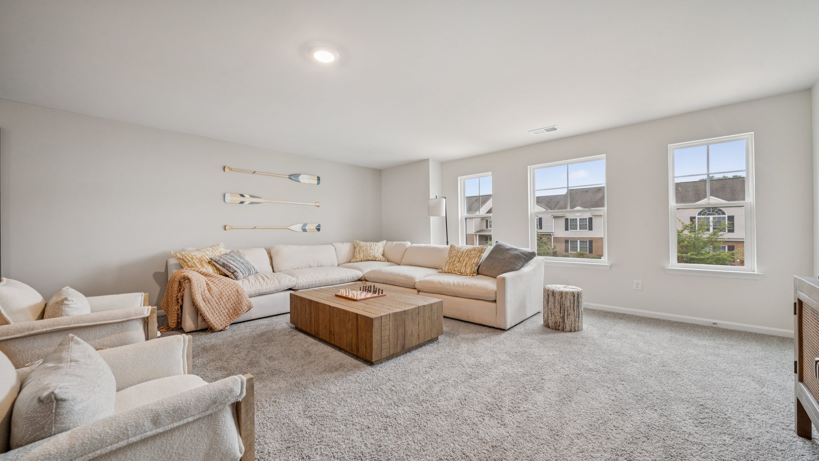 Loft + Secondary Bedroom, adjacent bedrooms, and bathrooms provide flexible living spaces