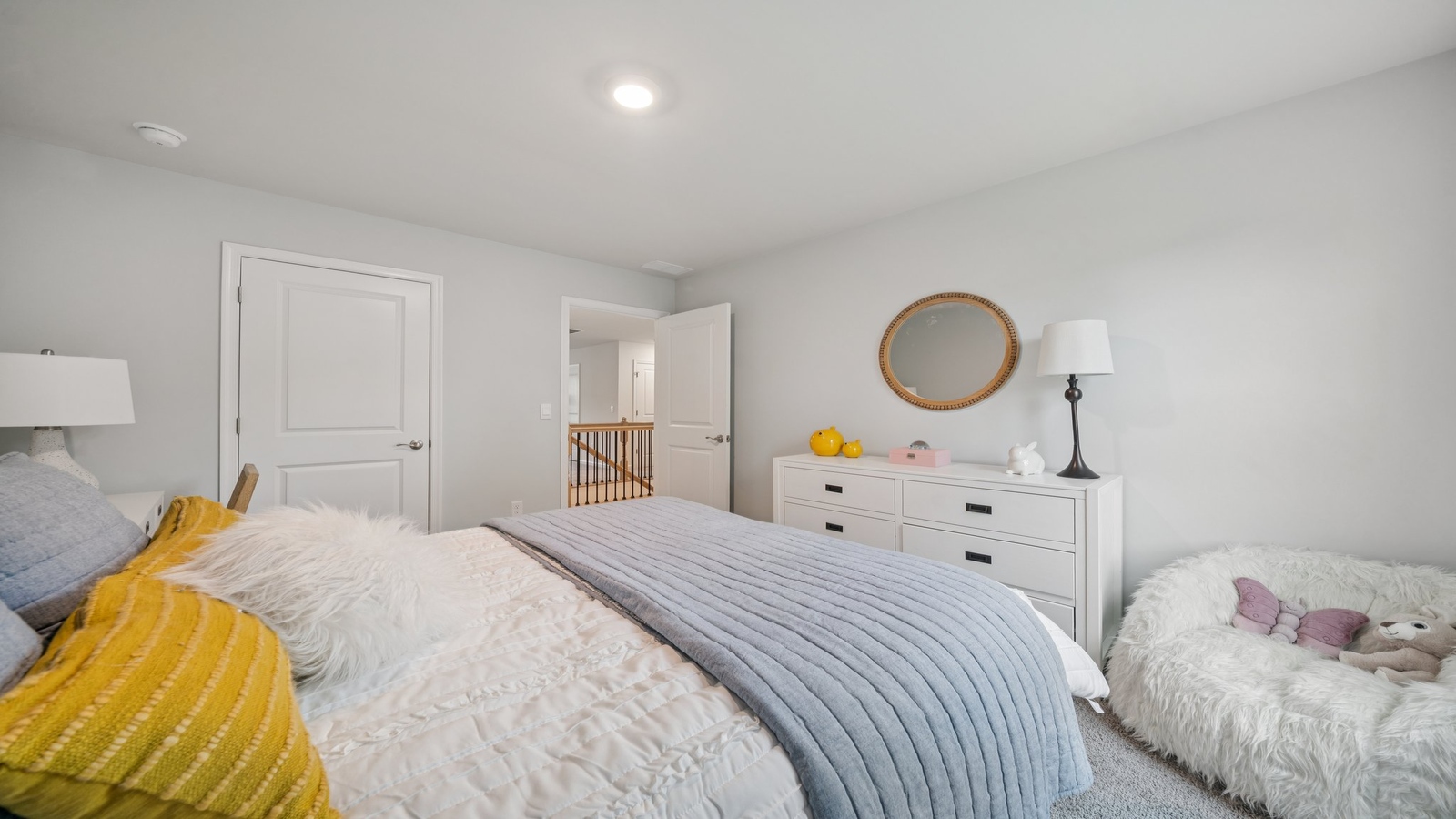 Secondary Bedroom in this New Home includes stellar carpet, bright window light, closet, ideal for guest or child use