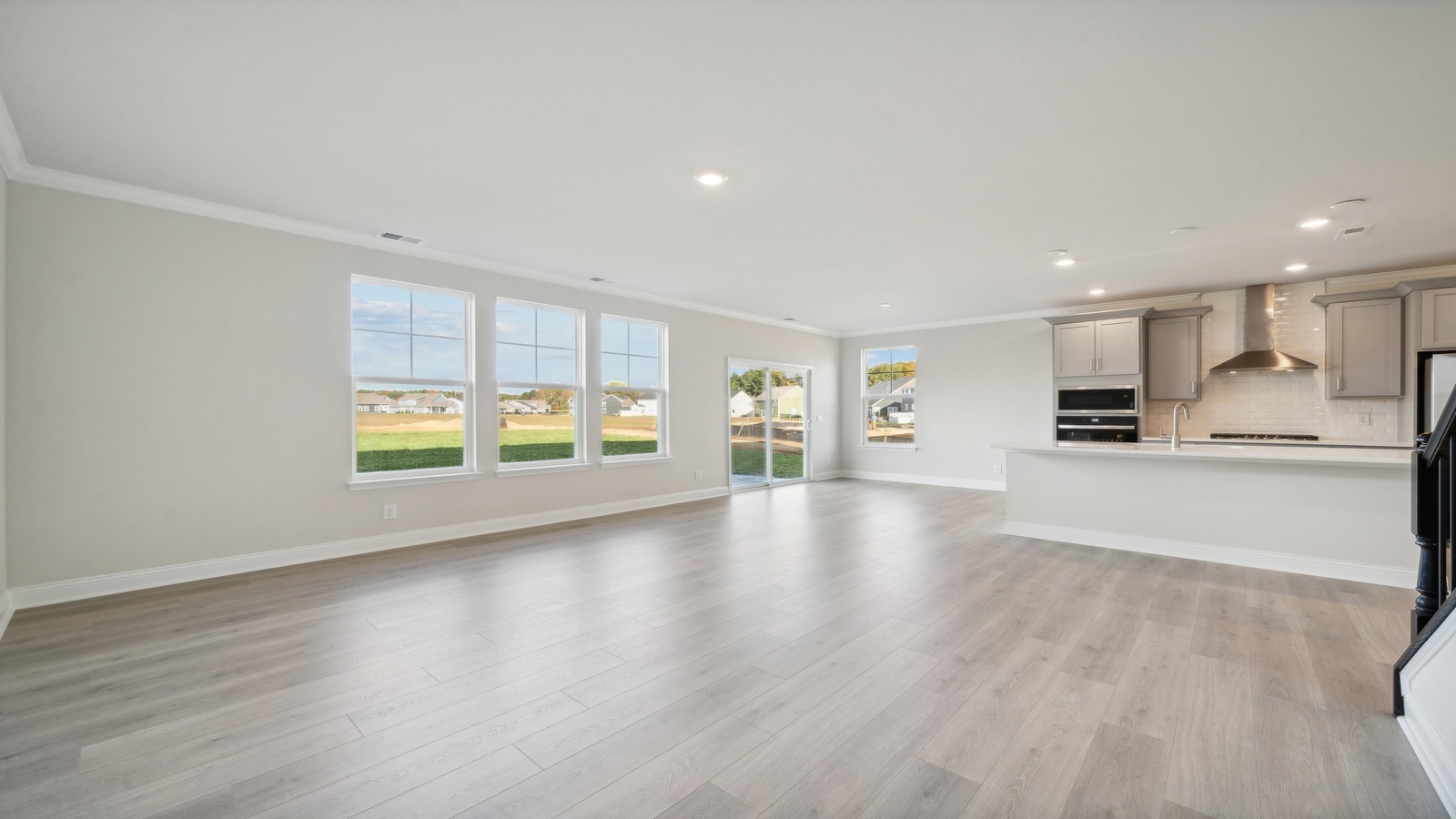 Modern kitchen layout with pantry, Prep zones, new appliance suite, cabinetry options at Riverview Landing