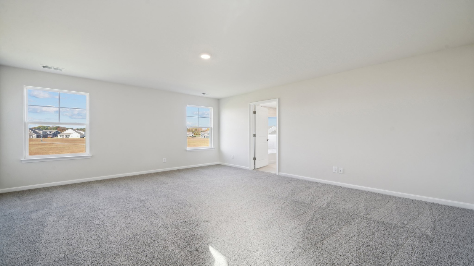 Loft + Secondary Bedroom, adjacent bedrooms, and bathrooms provide flexible living spaces