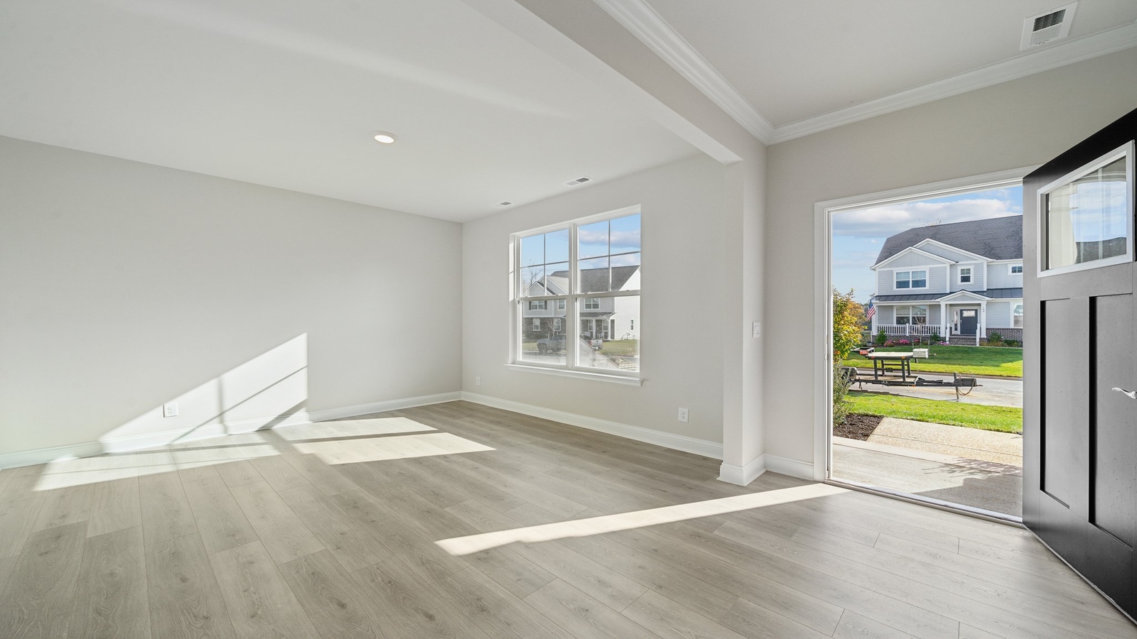 Entry corridor inside our home includes Modern Design trim, Smart Home panel placement, and easy access to main living areas