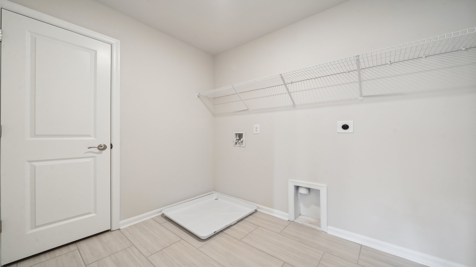 Riverview Landing utility laundry room includes smart designed overhead storage for efficient home organization