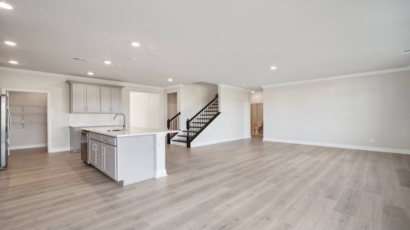 Smartly designed dining room in D.R. Horton Riverview Landing home near main foyer, kitchen, living room, stairs