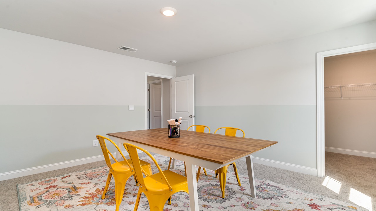 Light-filled flex-office-game room crafted by D.R. Horton of this thoughtfully designed home