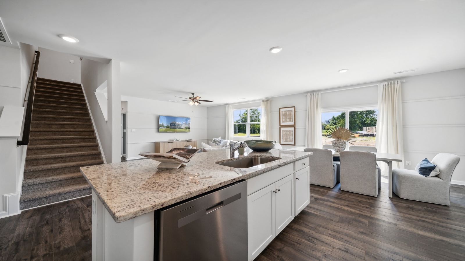 Functional kitchen island adds ample storage with a pantry, multi-prep zones, and new appliance suite