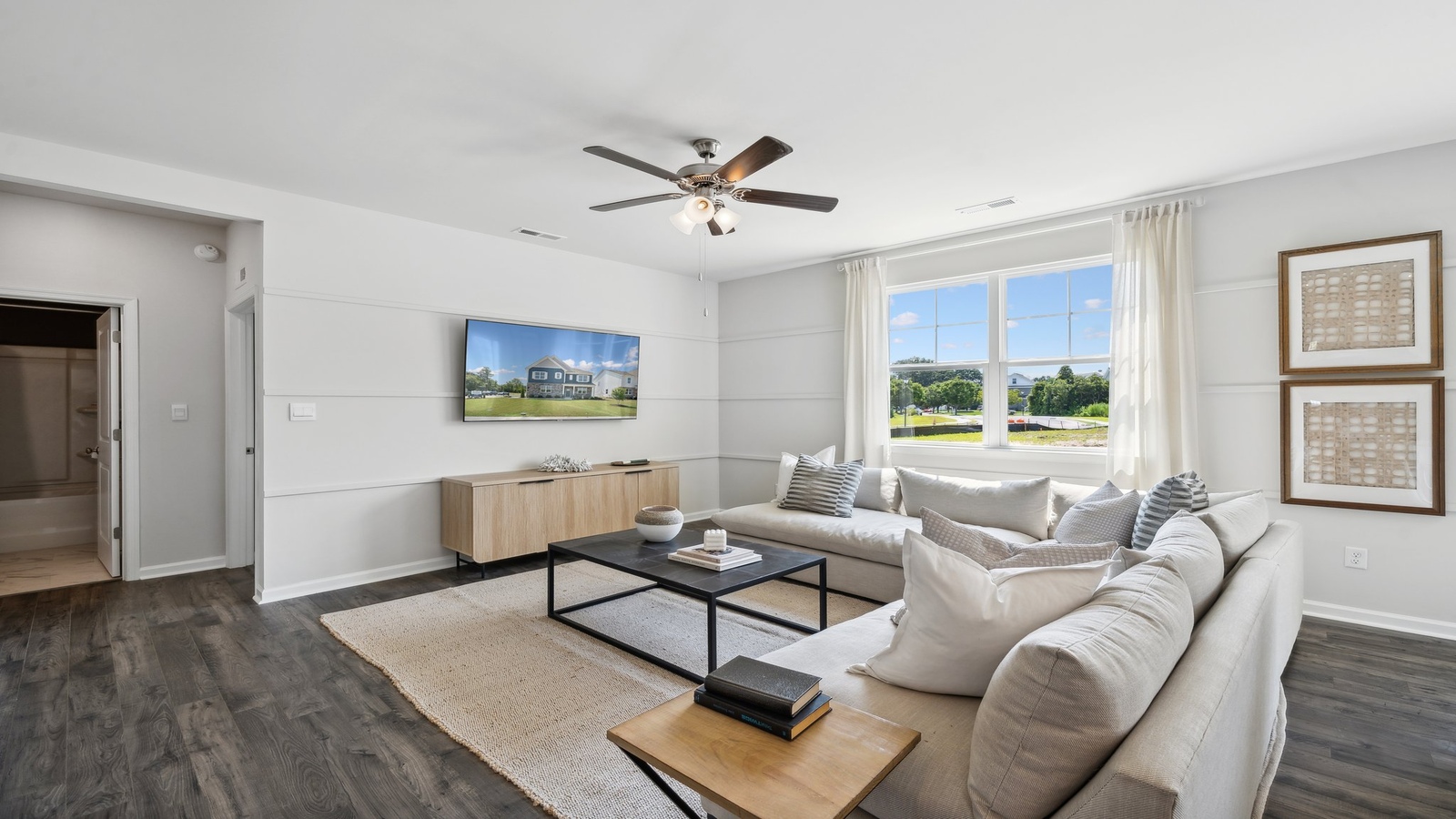 Living room built for daily living, entertaining with ample space, electric fireplace, simple fresh open concept designs