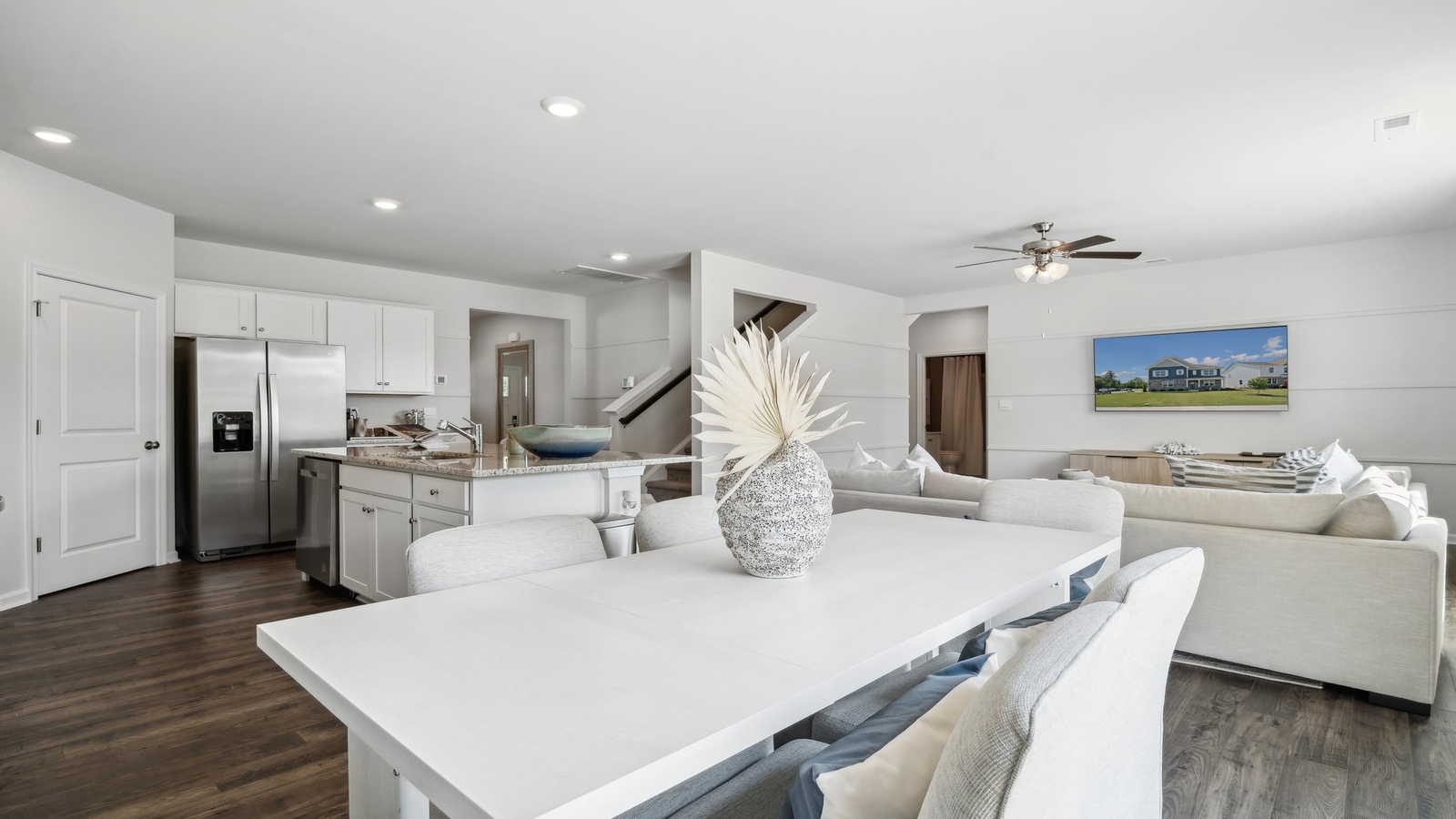 Dining room in Bennetts Pasture new home showcases our fresh open concept connectivity to main areas, stairs, front entry