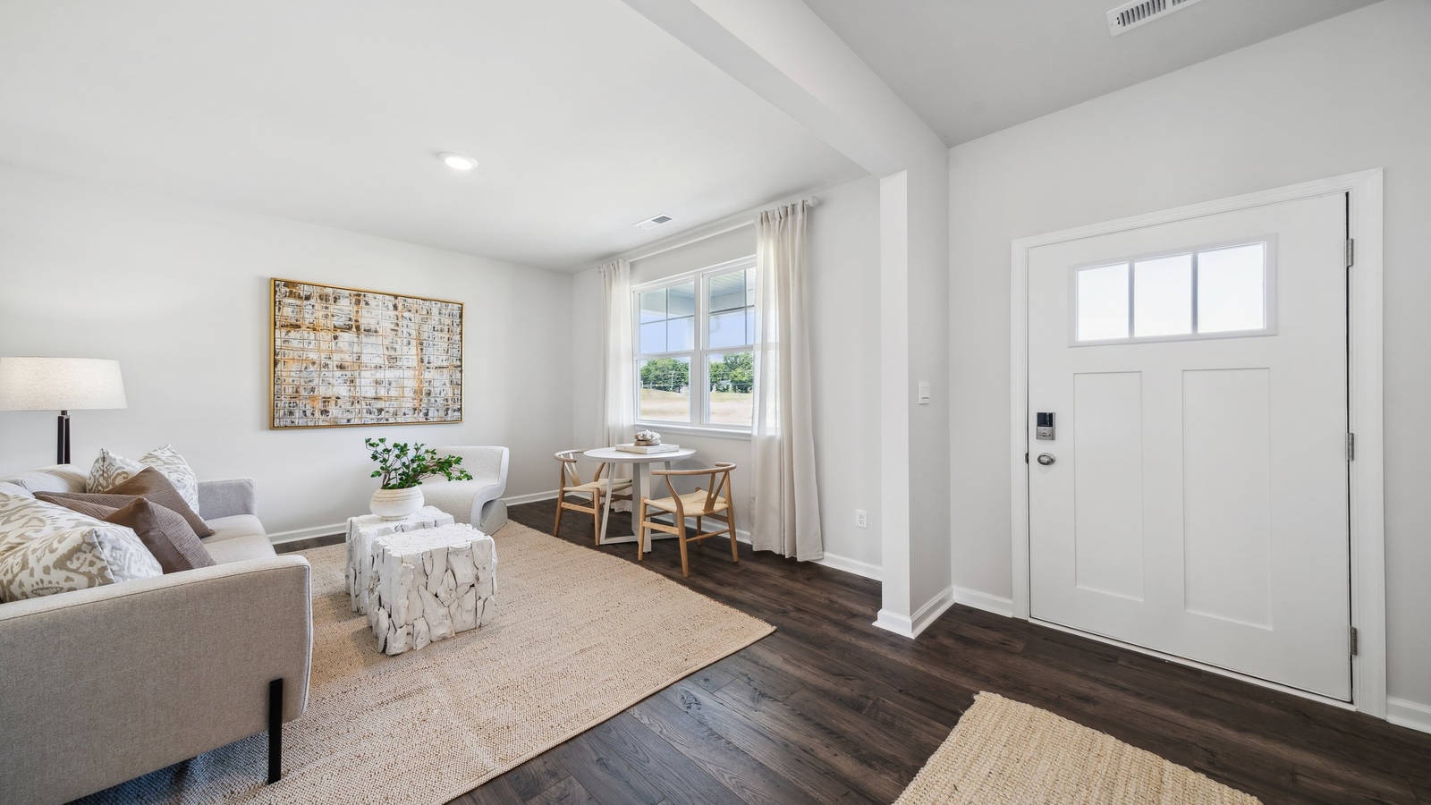 Wide foyer with bright daylight, quality flooring, and hallway access to residence at Bennetts Pasture