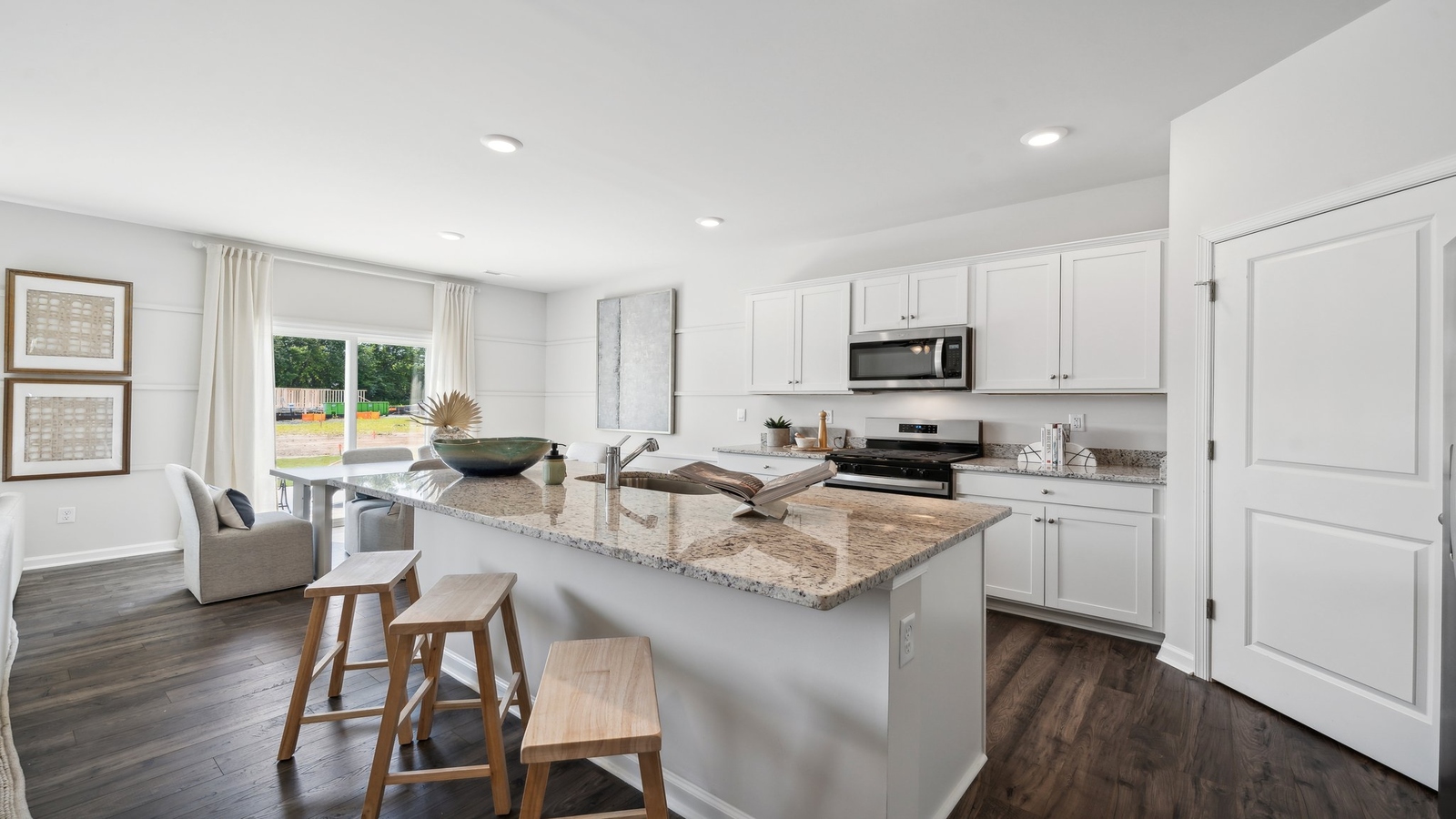 Central kitchen island with seating, crafted to anchor the home, pantry, meal prep zones, entertaining and everyday gathering