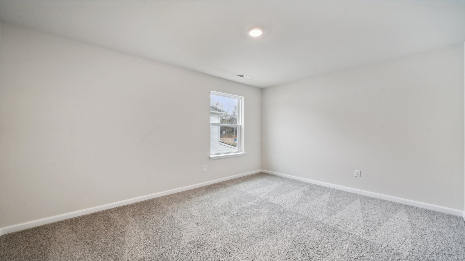 Secondary bedroom, flex-office, study, entertainment, and game room in this D.R. Horton new construction home Bennetts Pasture