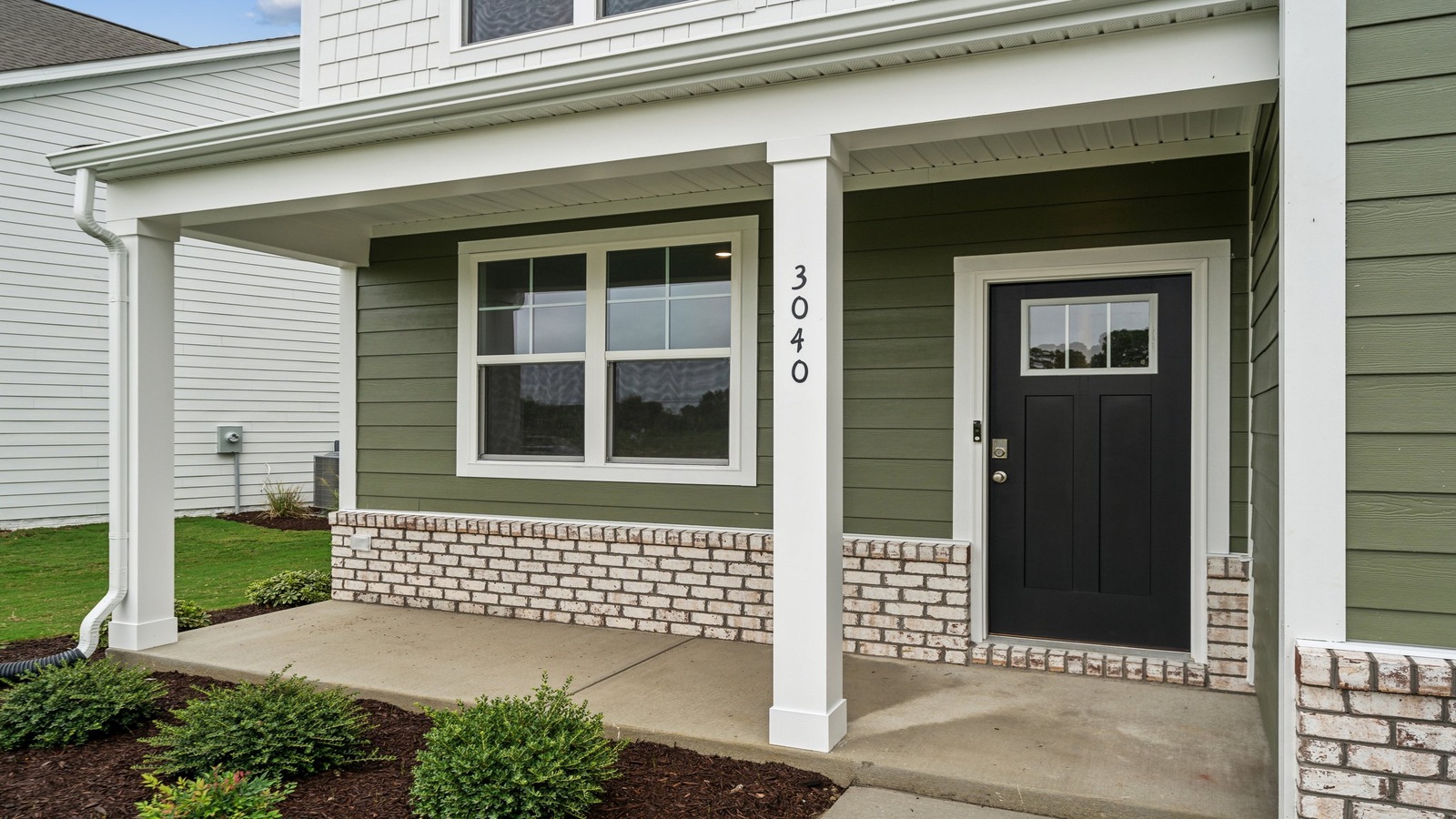 Street view of Front Door and Porch with main living access with sightlines in Bennetts Pasture