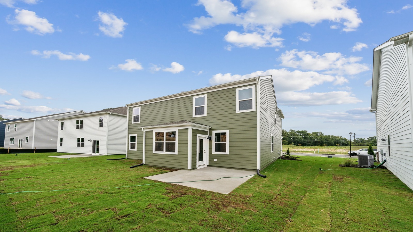 New House by D.R. Horton featuring paved patio for outdoor entertaining and backyard space ideal for gatherings