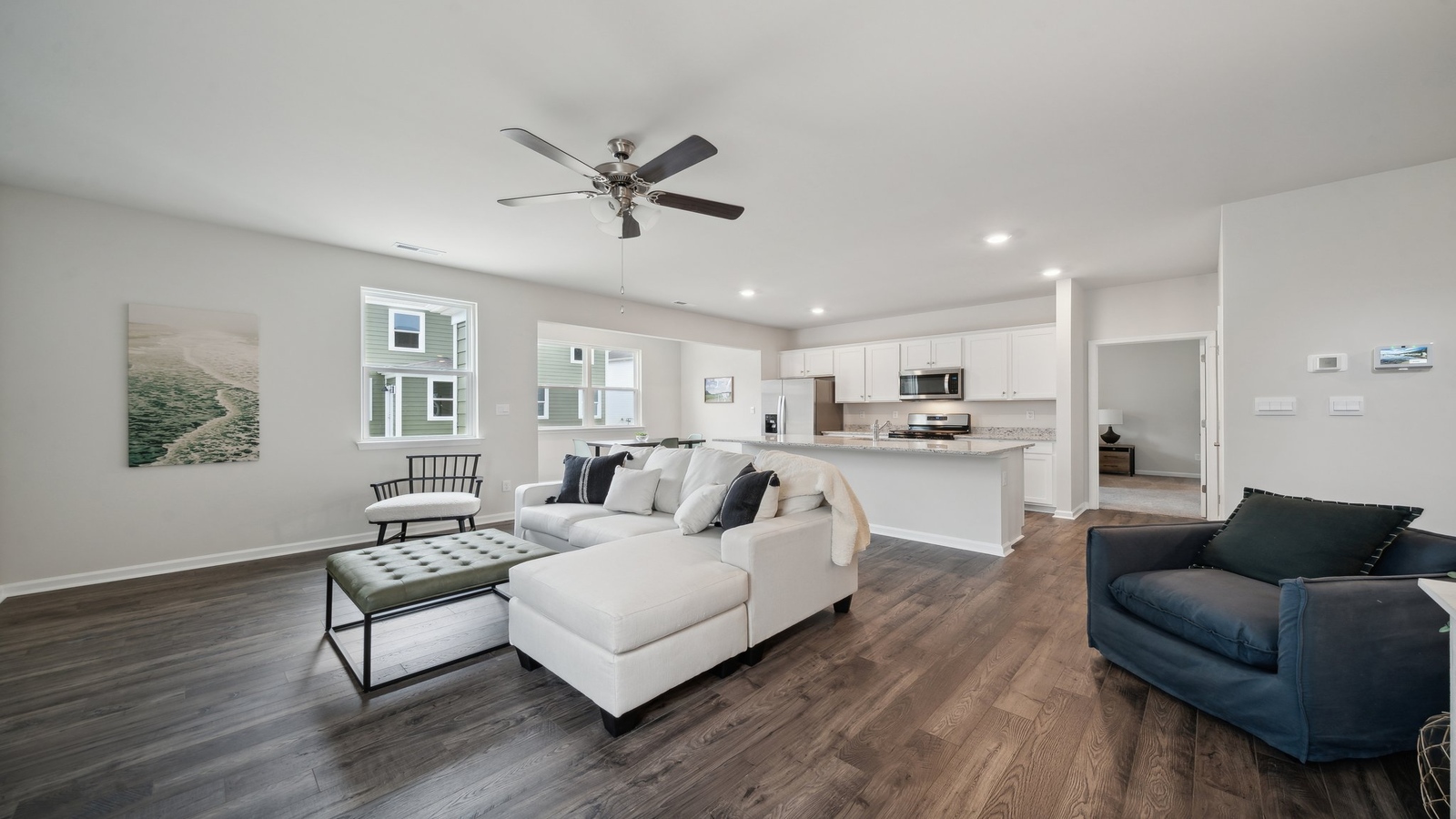 Main living zone with easy access near kitchen, dining area, and stairs in Bennetts Pasture