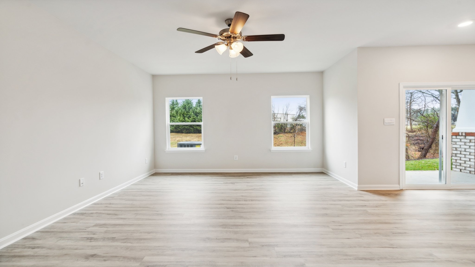 Living room built for daily living, entertaining with ample space, near front foyer, adding simple fresh open designs