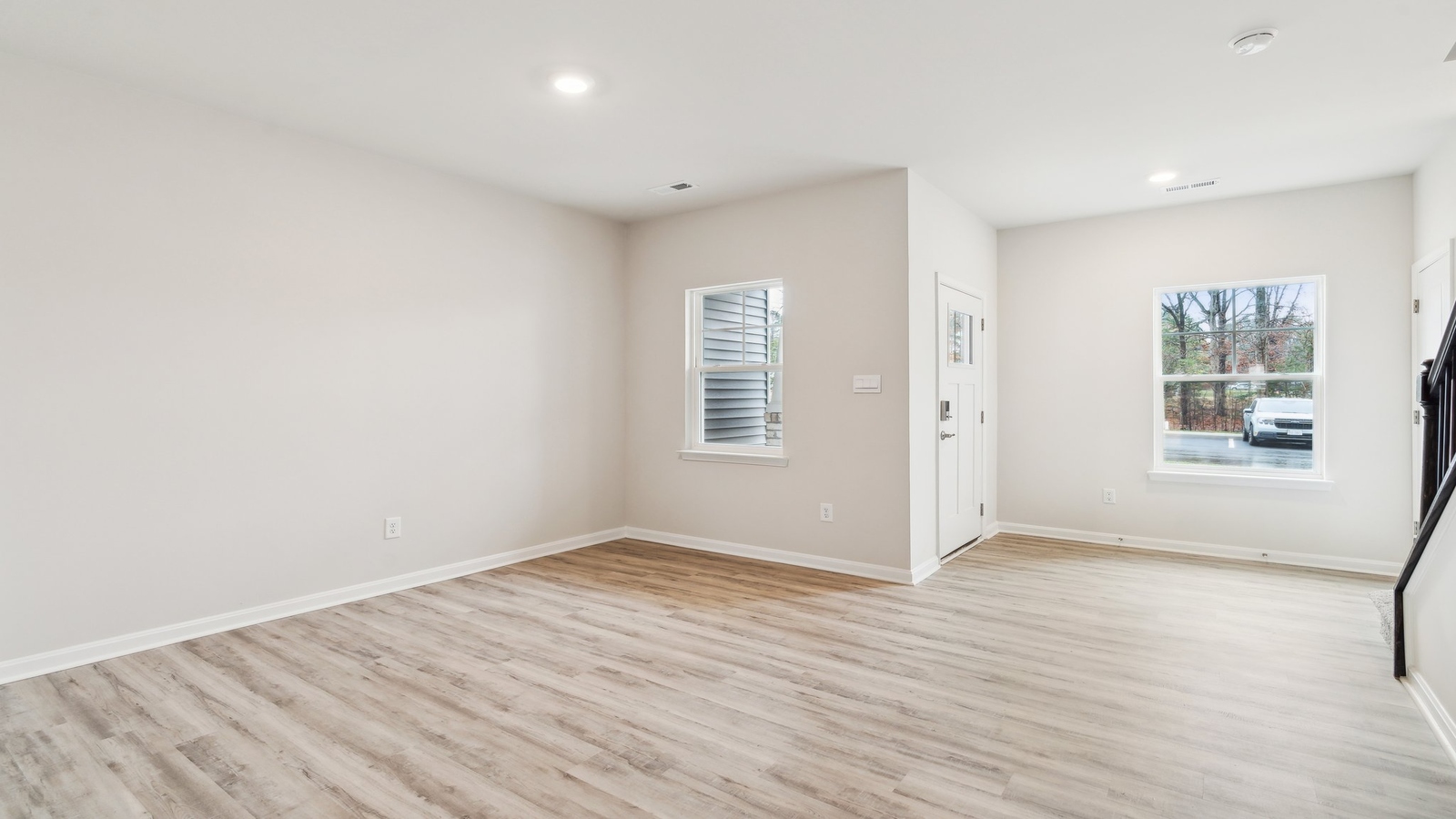 Dining room in Oak Crest Townhomes new home showcases our fresh open concept connectivity to main areas, stairs, front entry