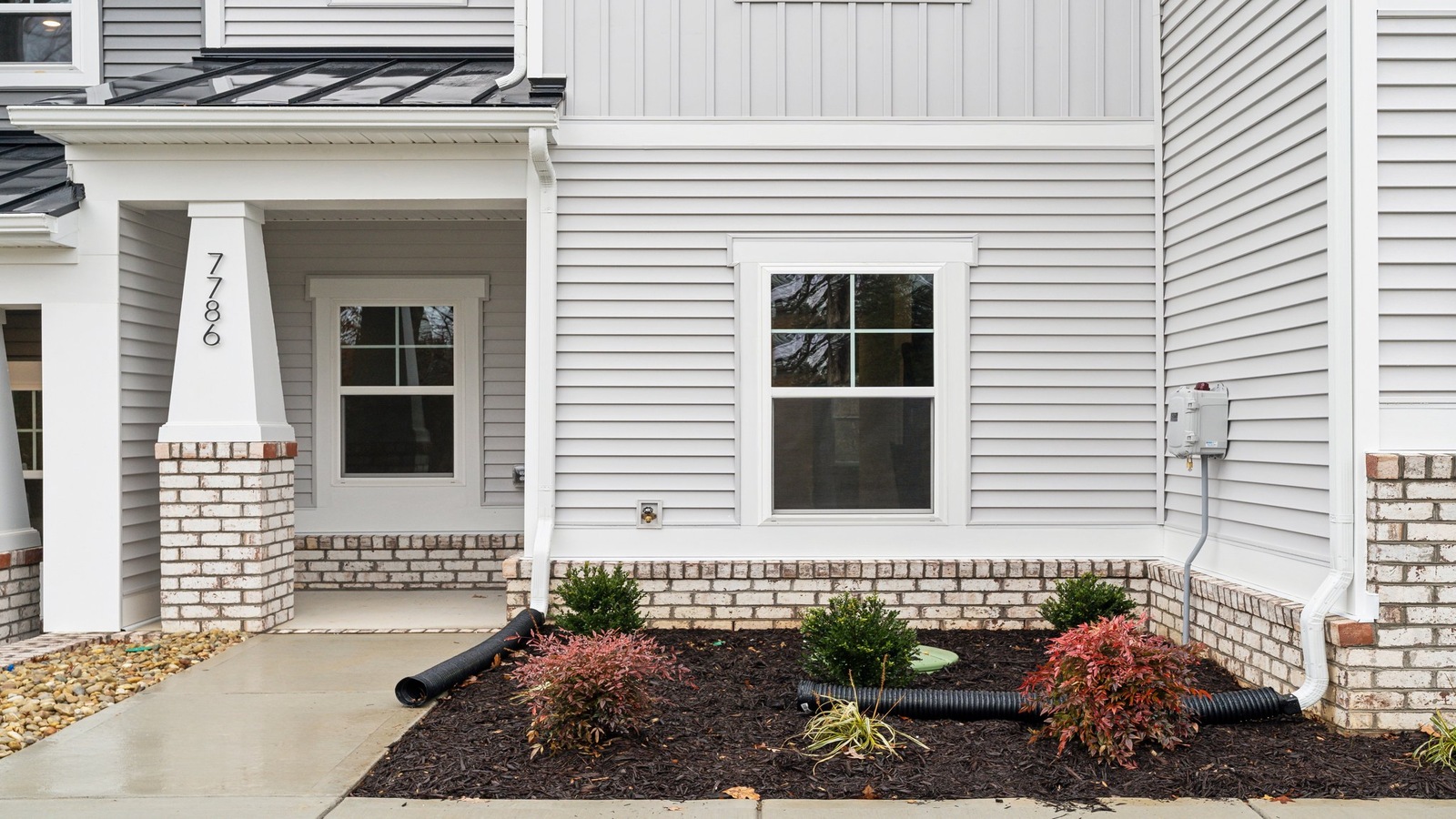 Oak Crest Townhomes home front porch main door entry, accessing the entrance in the home, living areas