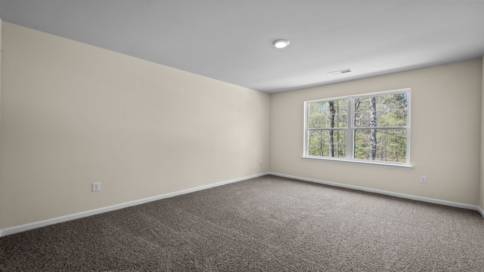 Versatile loft space with natural light and interior access to additional rooms in Maidens Farm