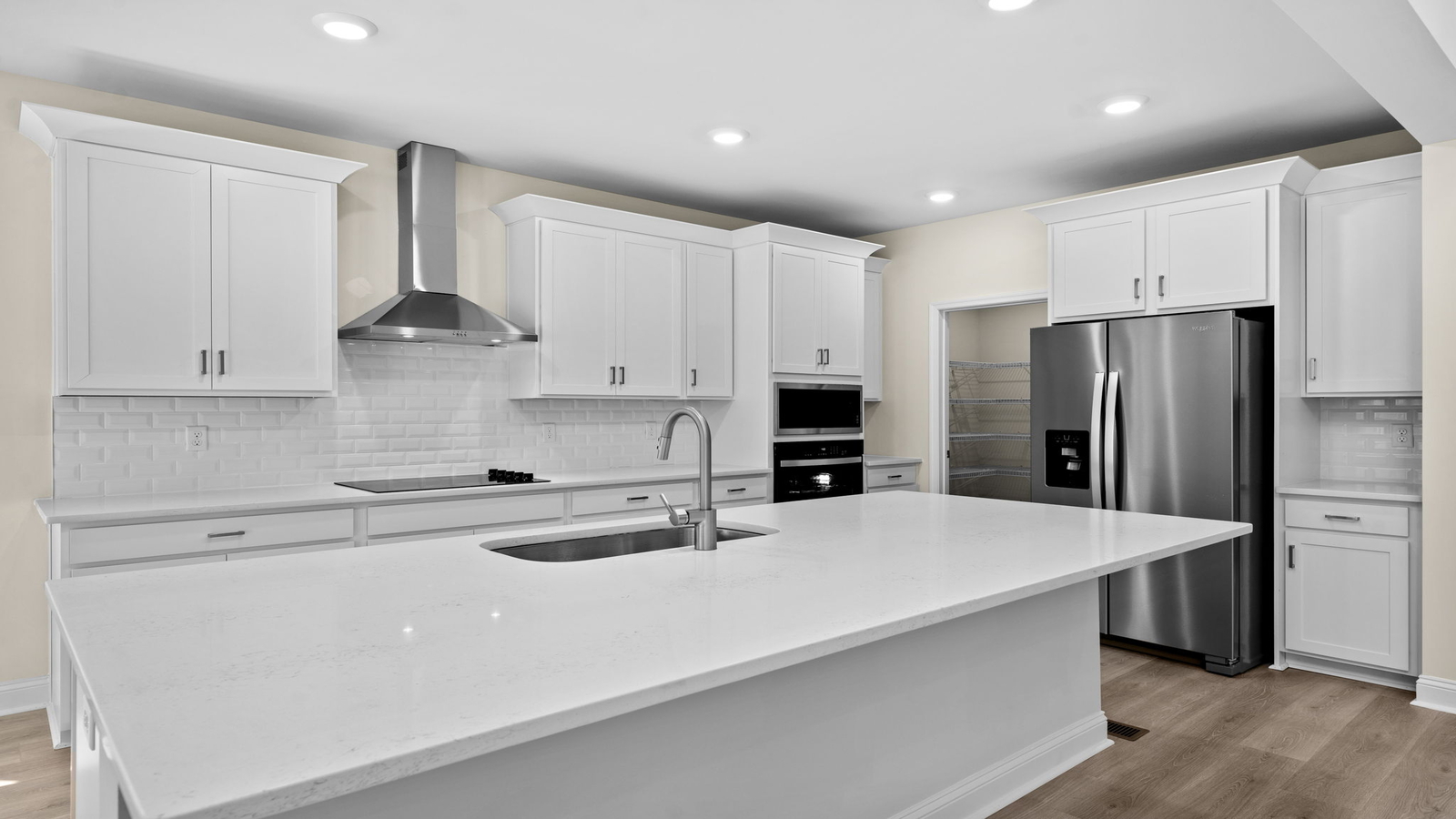 Spacious Kitchen island in this New Home, ideal for dining, daily prep, entertaining in our Fresh Modern Design layout