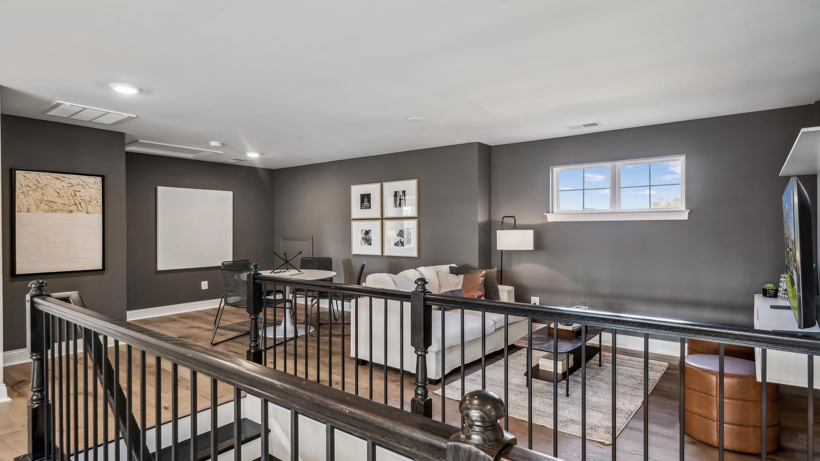 Loft + secondary bedroom with quality carpet, wide landing entrance, multi-use flow into bedrooms, bathroom, stairs.