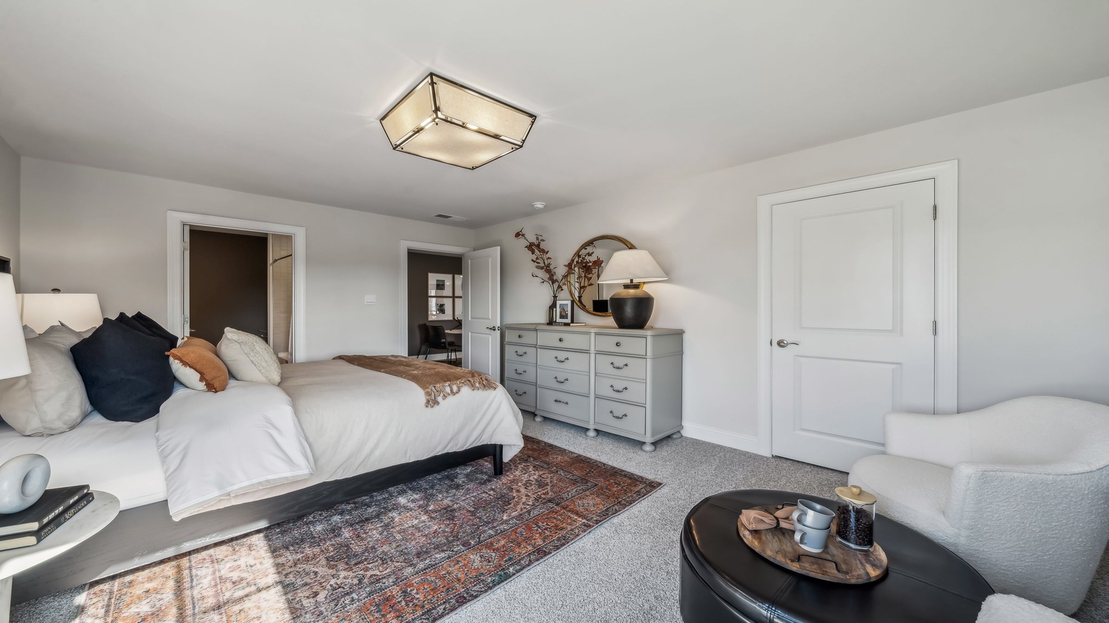 Secondary Bedroom in Maidens Farm showcases quality flooring, closet space, soft window light, and convenient home access
