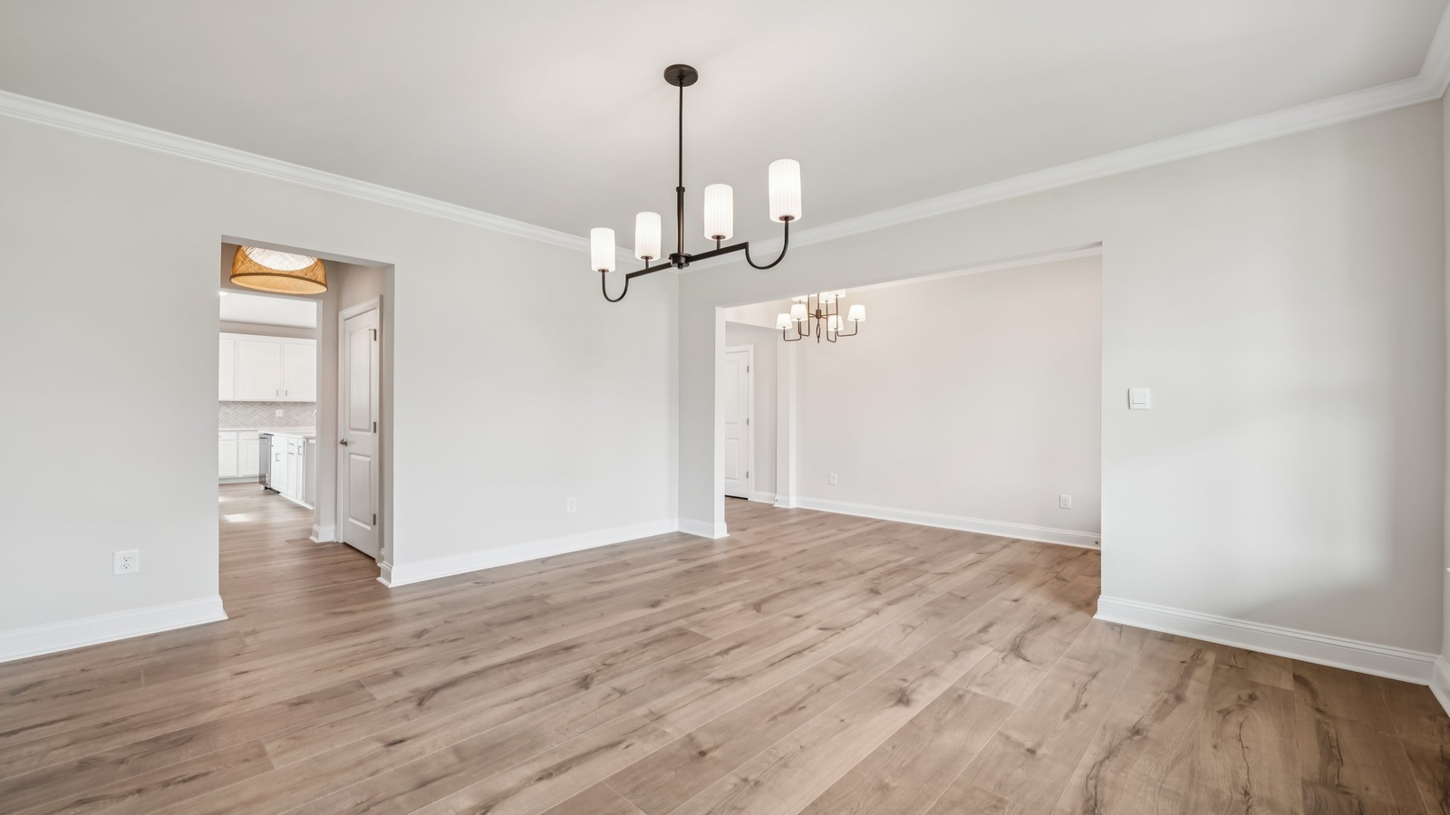 Dining room in Sheppard Mill is ready for entertaining and flow with kitchen and living rooms