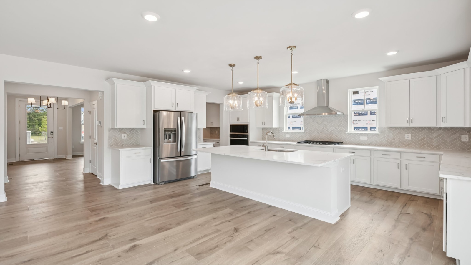 This kitchen-living-dining area supports a relaxed daily life with Fresh Open Concept designs and smart appliance placement.
