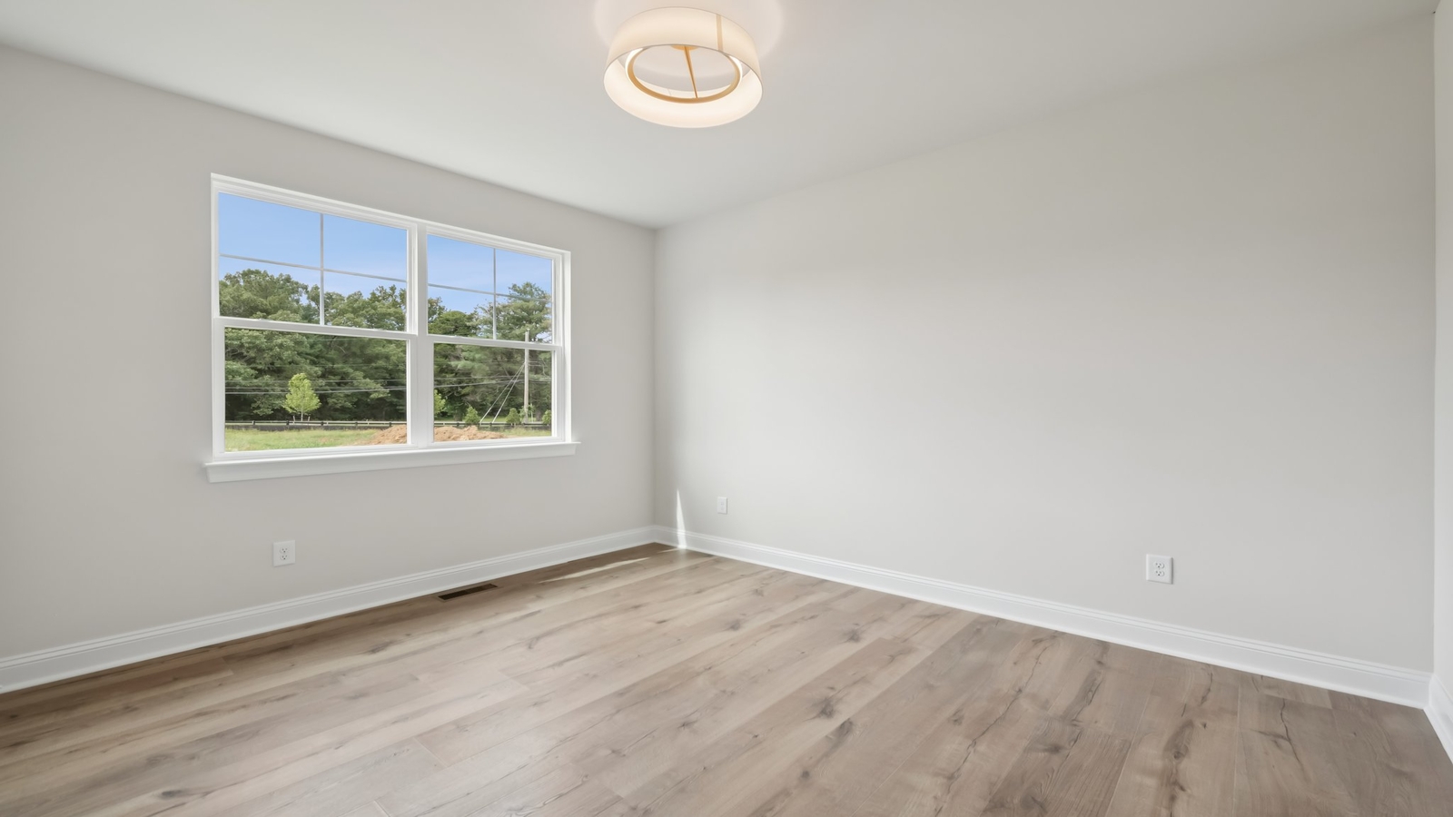 Smartly designed dining room in D.R. Horton Sheppard Mill home near main foyer, kitchen, living room, stairs