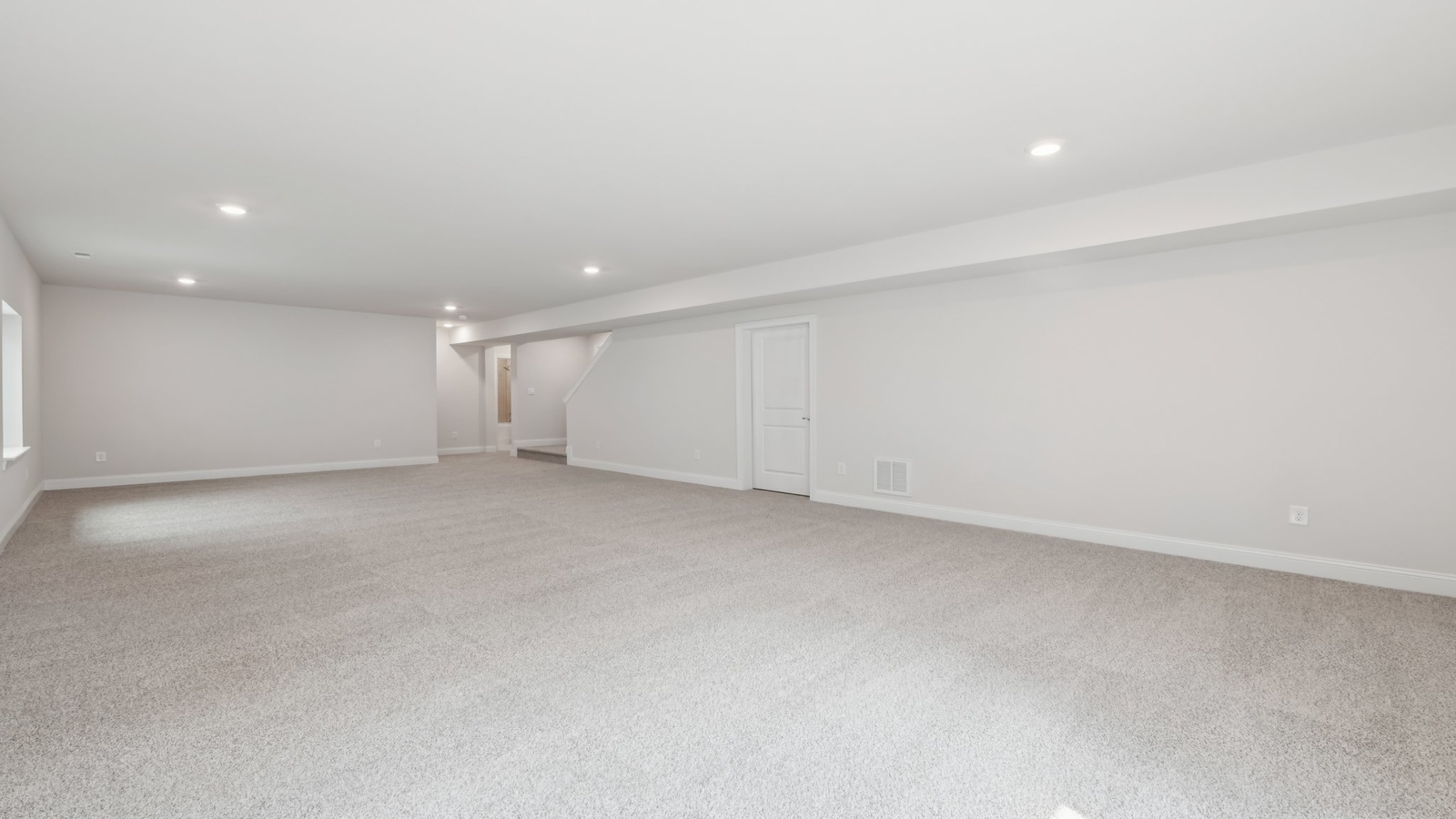 Basement game room with recessed lighting and flexible space for entertainment or relaxation at Sheppard Mill
