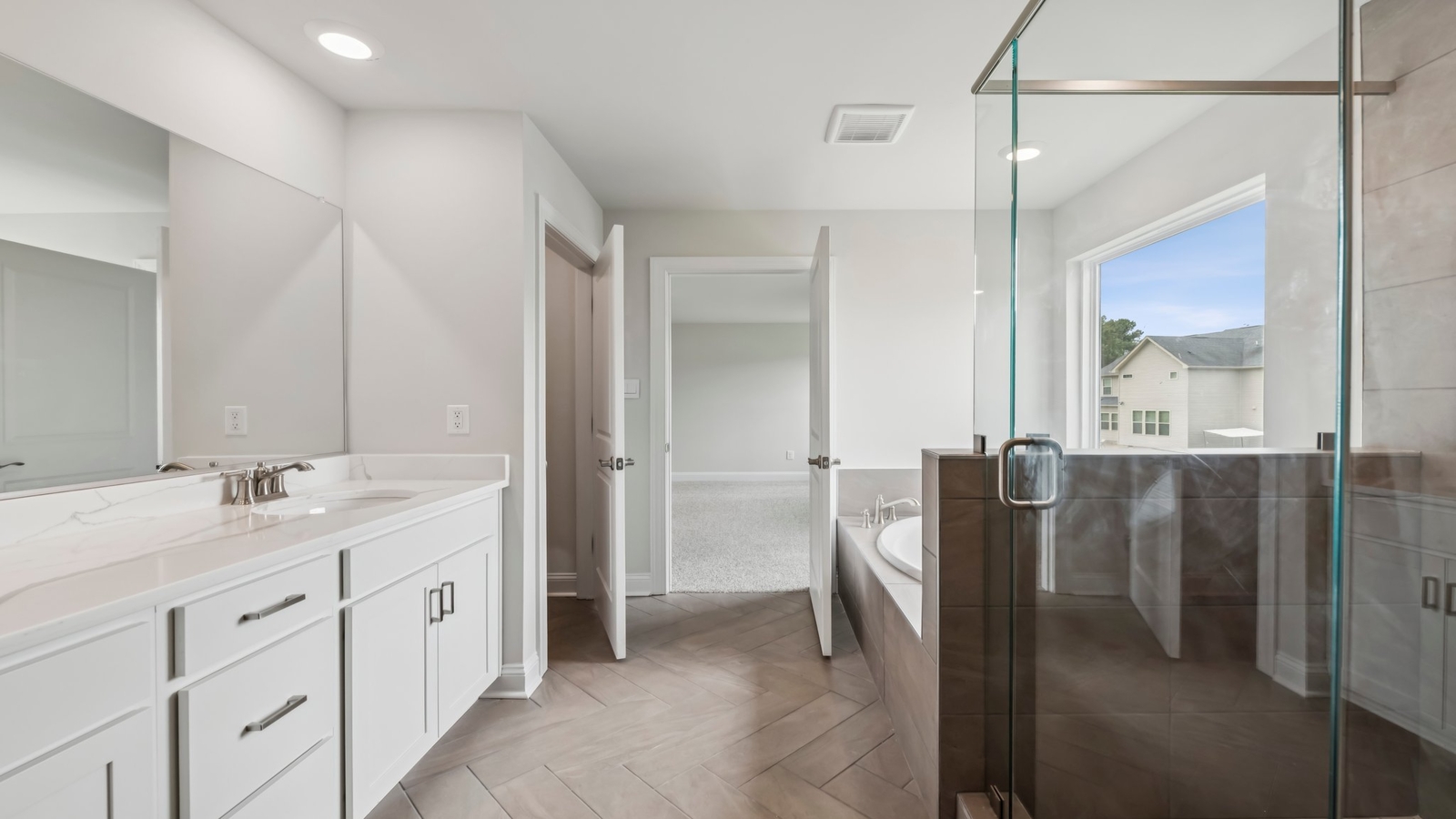 Owner's En-suite bathroom adds stylish appeal, spa-inspired designs and access to the owner’s bedroom and Walk-in closet