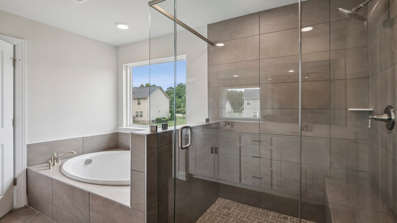 Modern ensuite bathroom designed layout offering secluded comfort with updated fixtures and clean sightlines