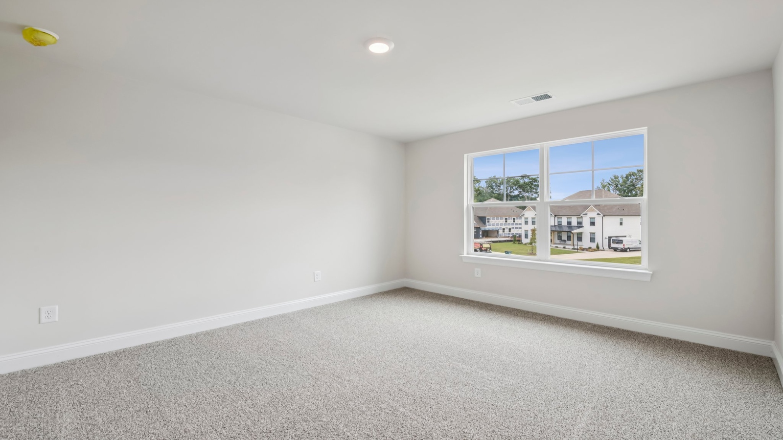 Secondary Bedroom showcases space via single door closet, window, convenient home access Maidens Farm