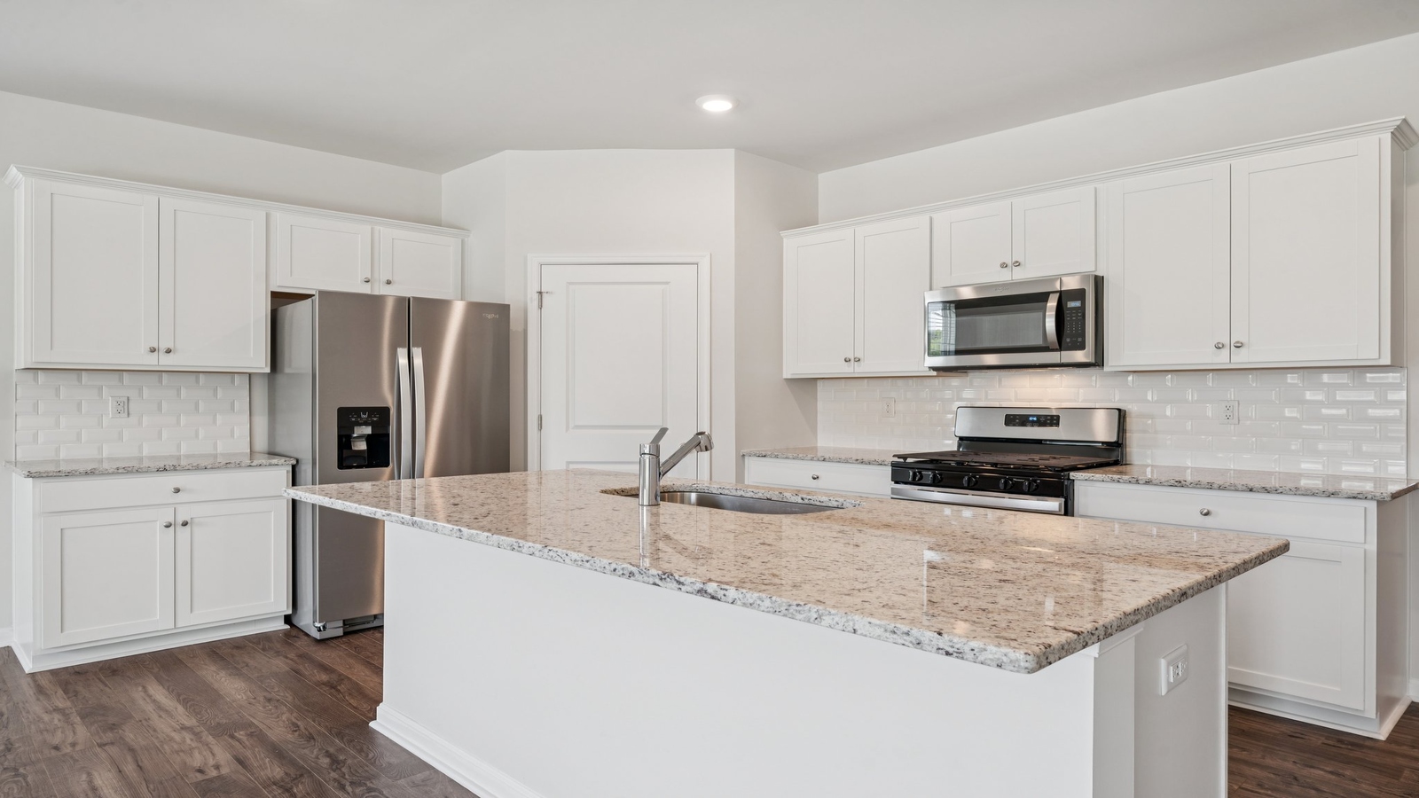 Well designed living-kitchen areas at Smith Farm, offering a Modern planned efficient use of space with rear yard visibility