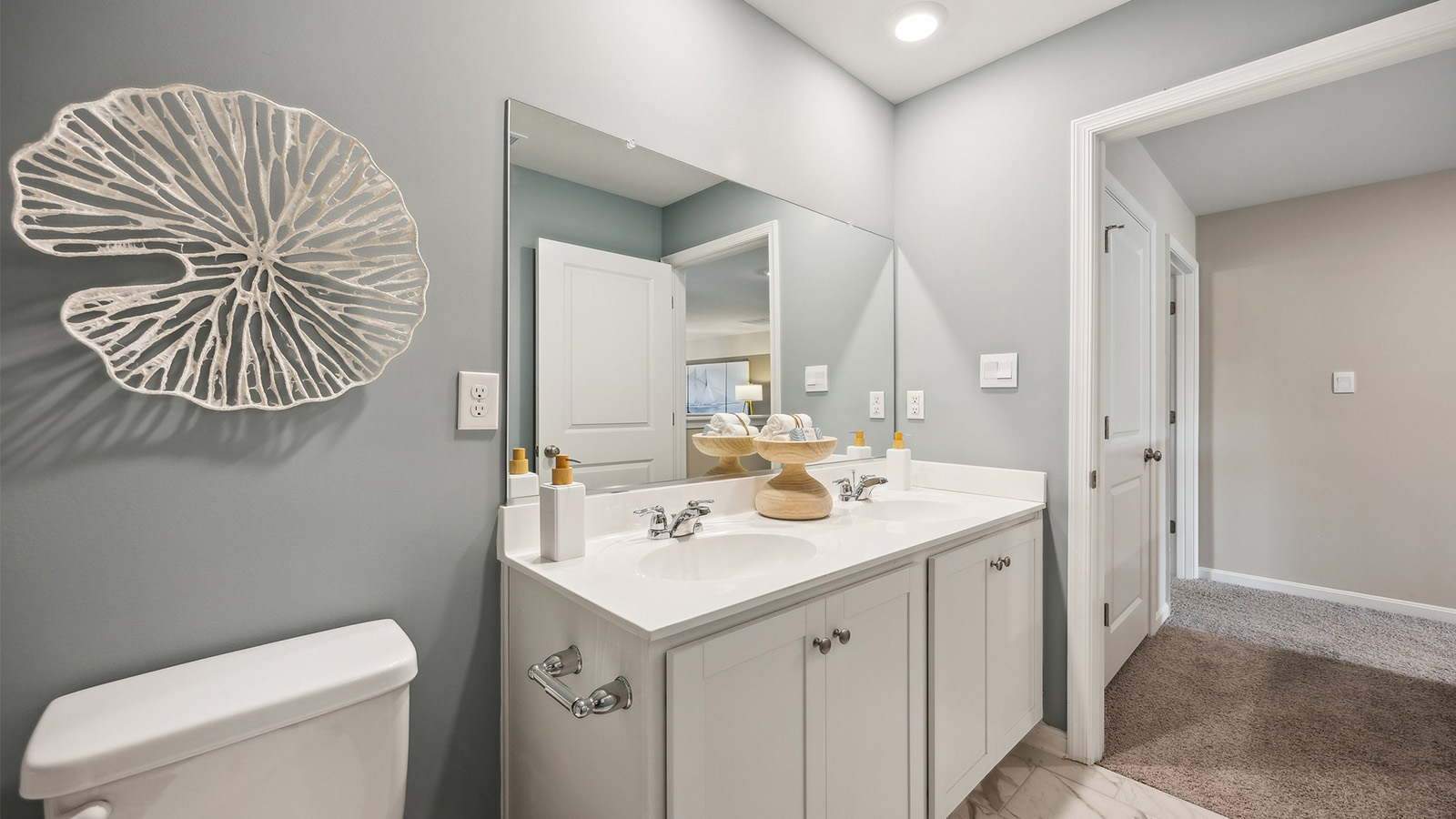 Secondary bathroom with quality combination shower-tub, cabinet storage, vanity at Smith Farm