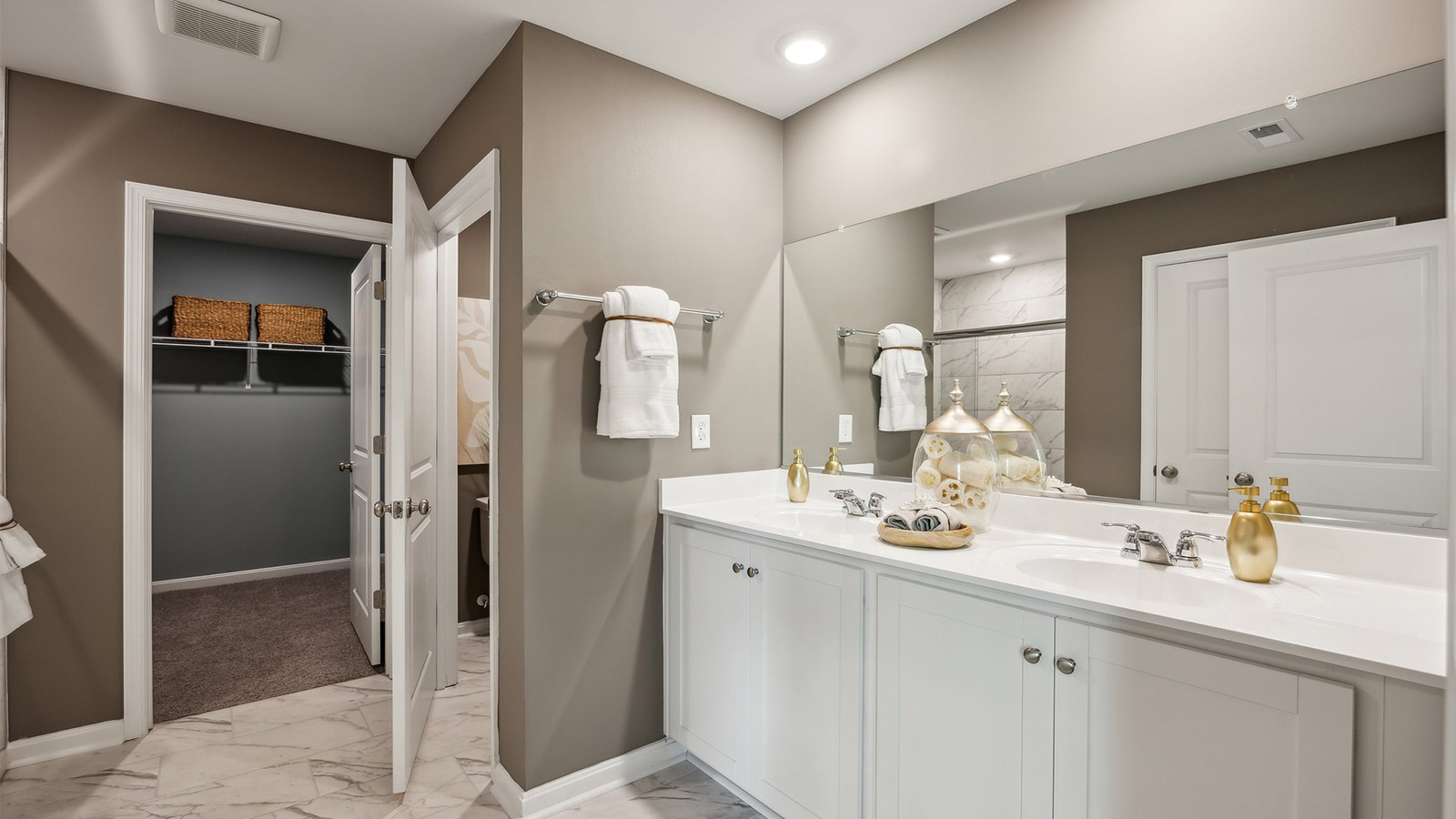New Home showcases a spa-inspired ensuite bathroom with quality upgrades, open design to shower-tub, and walk-in closet