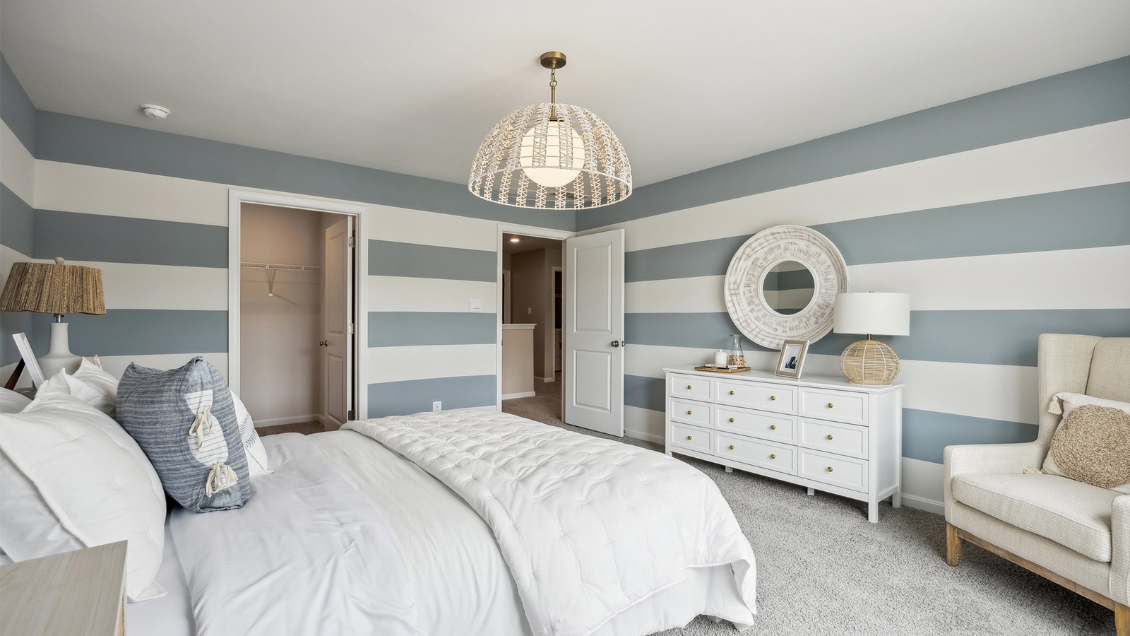 Secondary Bedroom in Smith Farm showcases quality designs with closet space, soft window light, and convenient home access