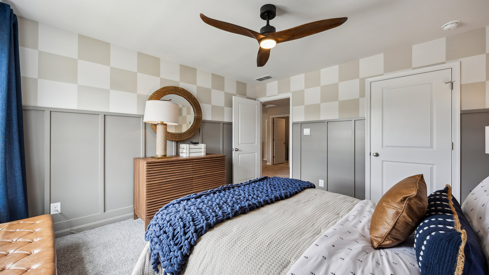 Secondary Bedroom with window adding soft exterior light, upstairs connections to shared bedrooms and bathroom