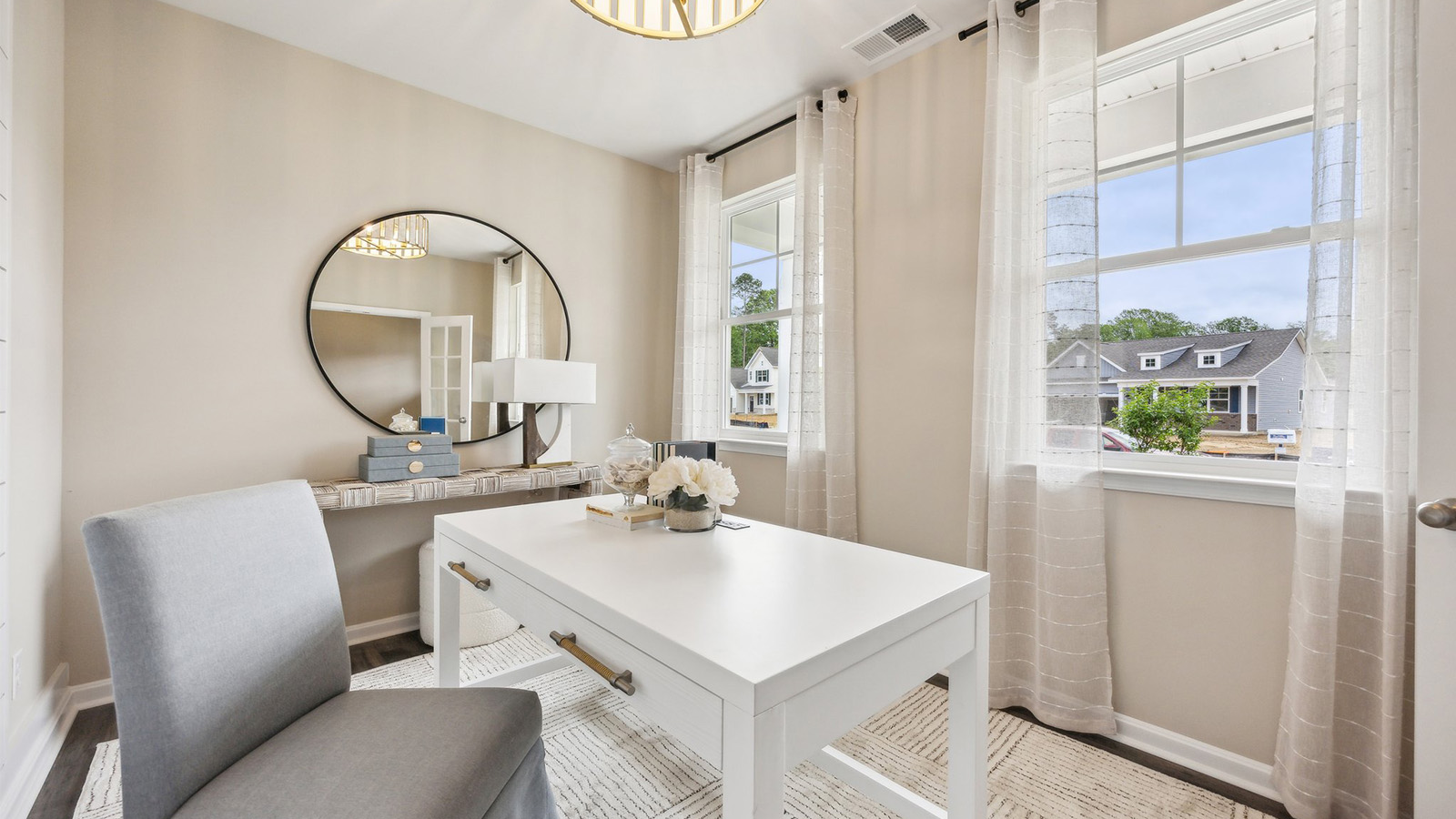 Light-filled flex-office-game room crafted by D.R. Horton of this thoughtfully designed home