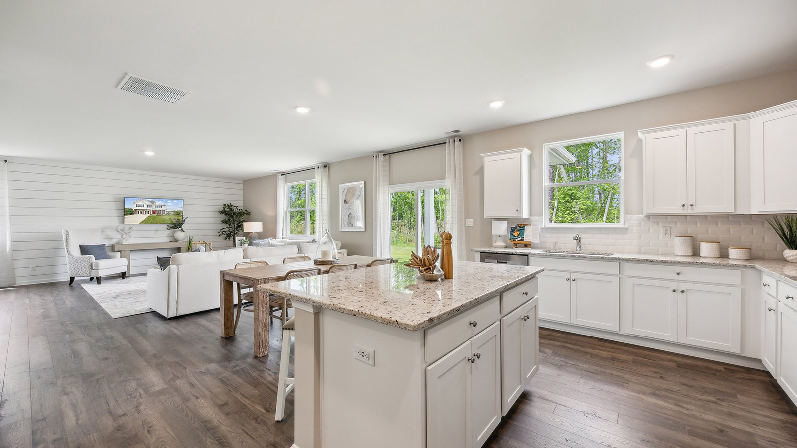 Our kitchen features a large island with seating, pantry, New appliance suite, stairs access, Modern Design finishes