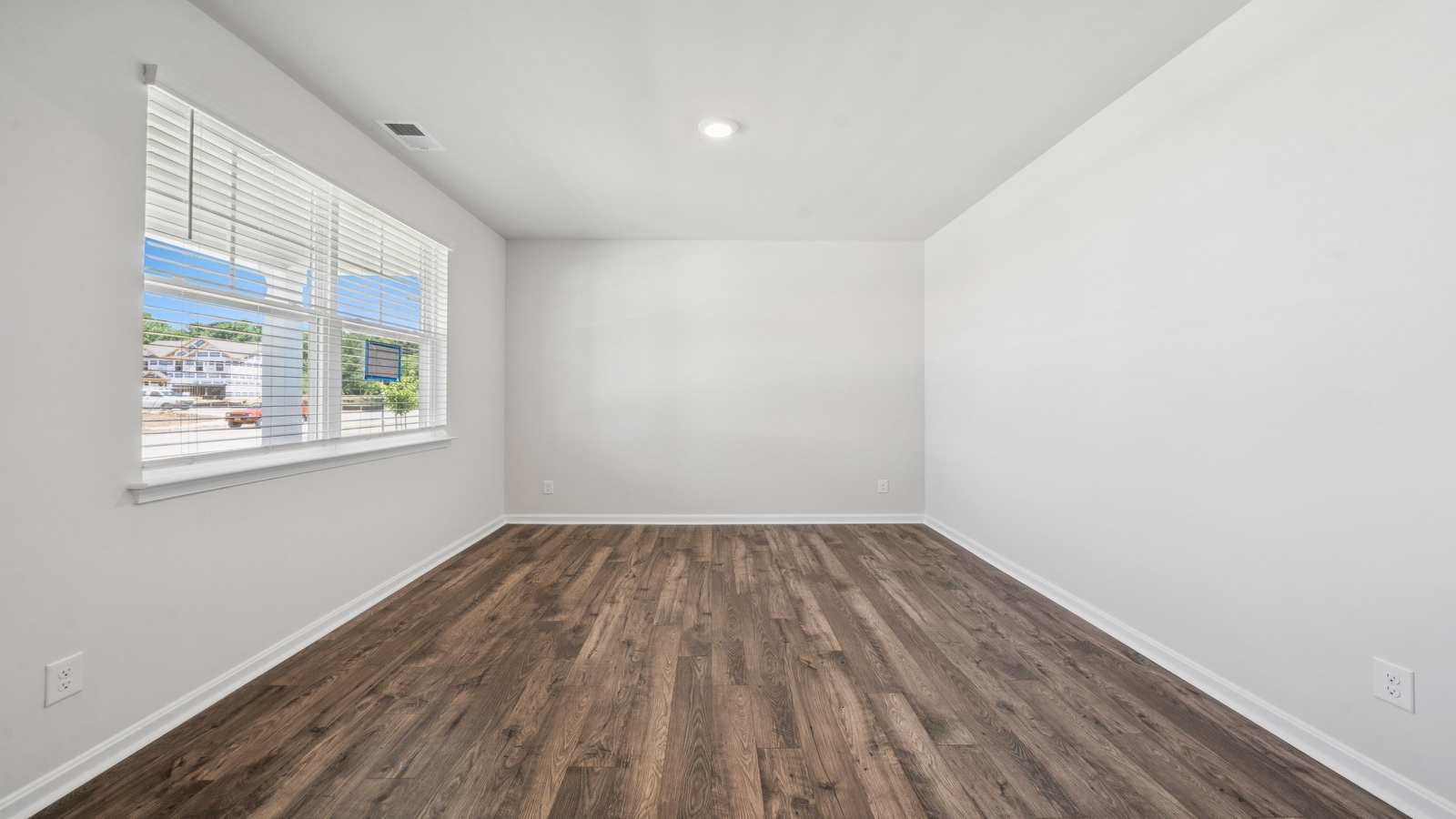 Modern front door with a new door, quality flooring bright sunshine in Smith Farm sitting room
