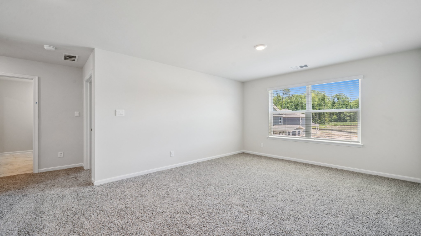 Loft + Secondary Bedroom, adjacent bedrooms, and bathrooms provide flexible living spaces