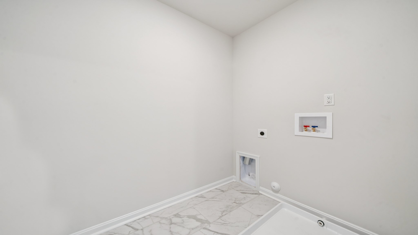 Smith Farm utility laundry room with new washer-dryer, overhead storage for efficient home organization