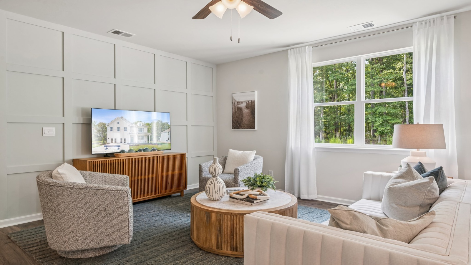 Comfortable main living space with connected kitchen-dining areas in Green Spring Estates