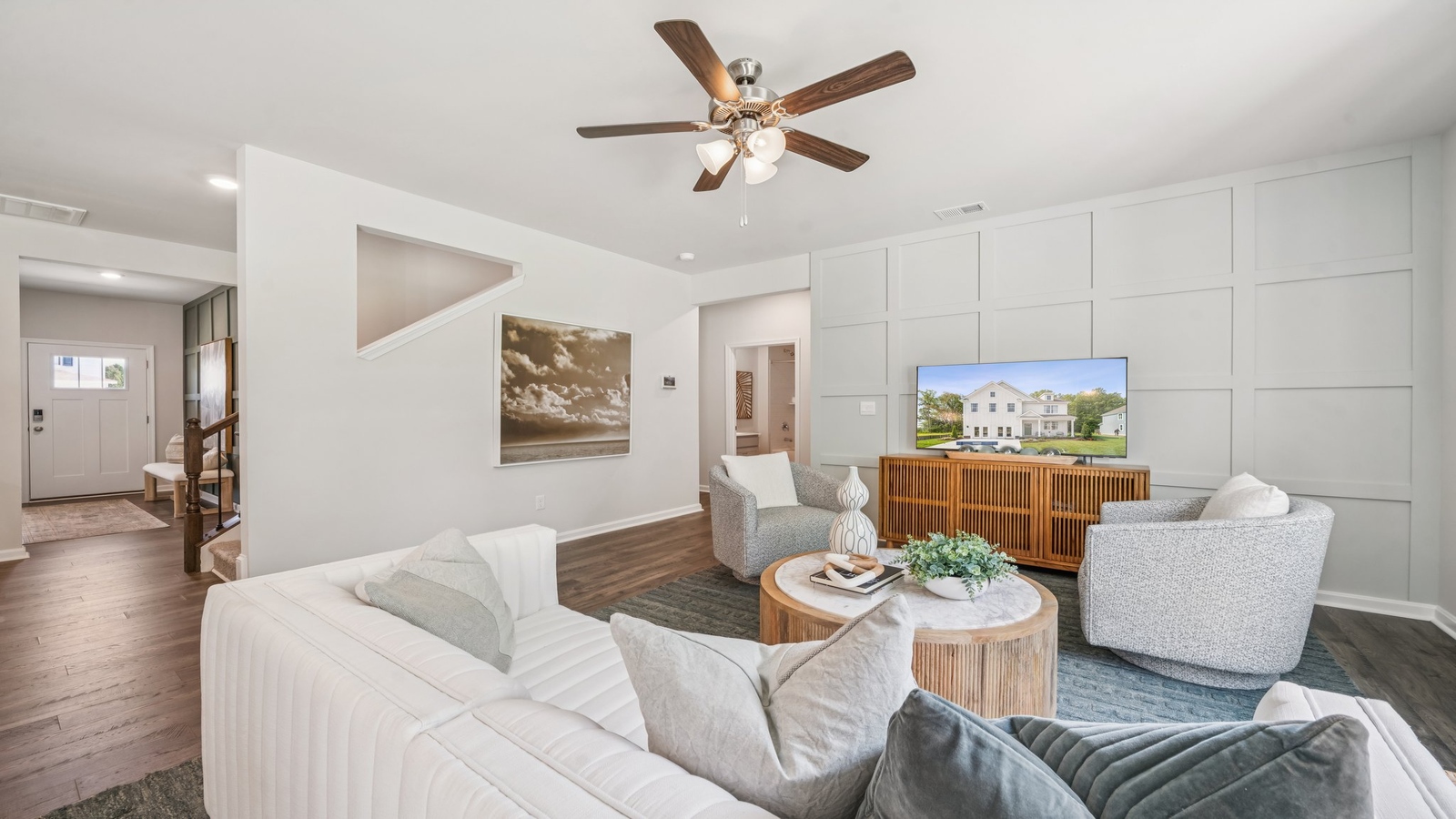 Living room features quality throughout, fresh open concept flow to the kitchen, dining areas, stairs Green Spring Estates