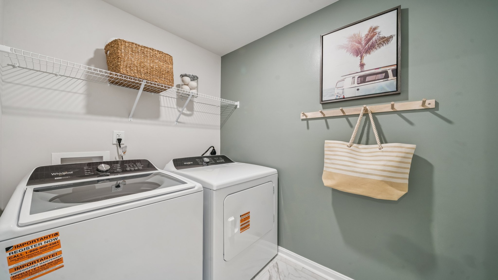 Laundry room with brand new washer and dryer, upper storage, folding area Green Spring Estates