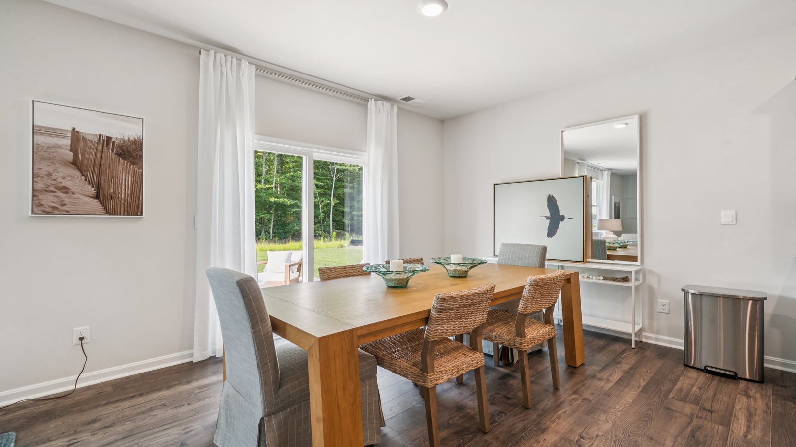 Spacious kitchen island with island, seating, pantry, new appliances, and an open layout connected to living area