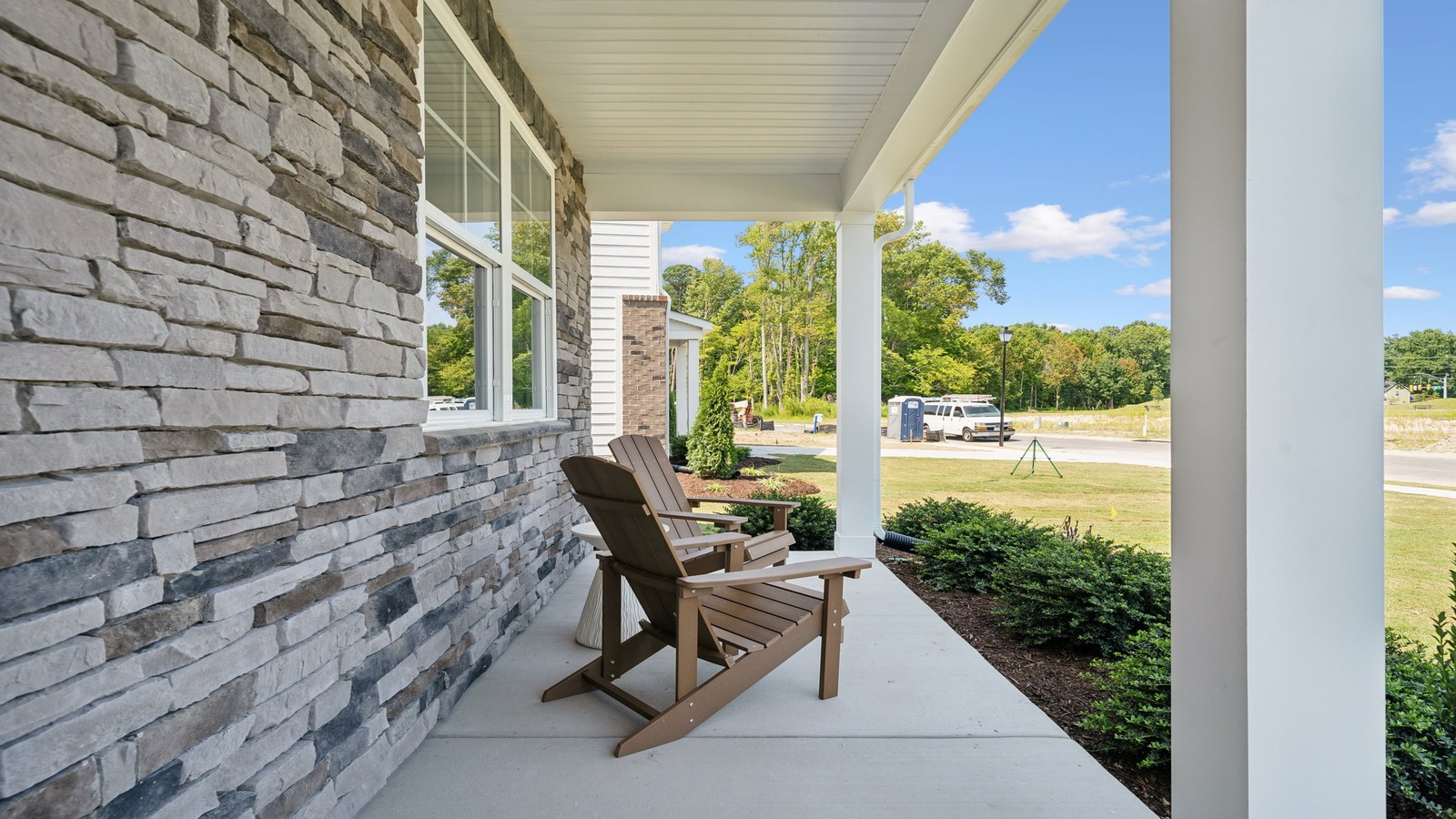 Green Spring Estates home front porch street view and main door entry, accessing the main entryway, living areas