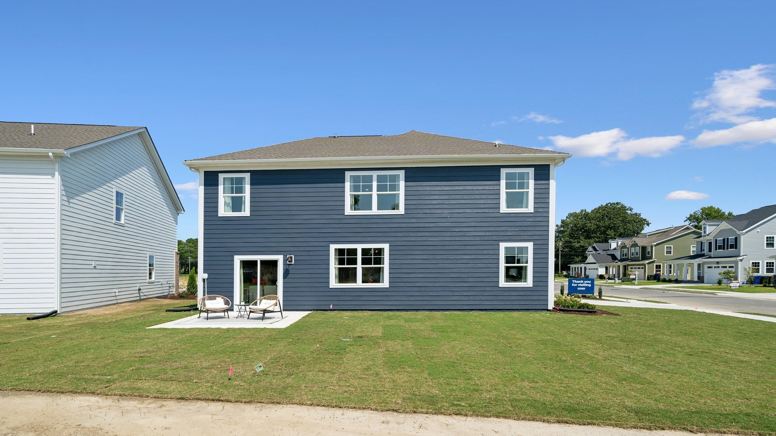 New House by D.R. Horton featuring paved patio for outdoor entertaining, backyard and grass space ideal for gatherings